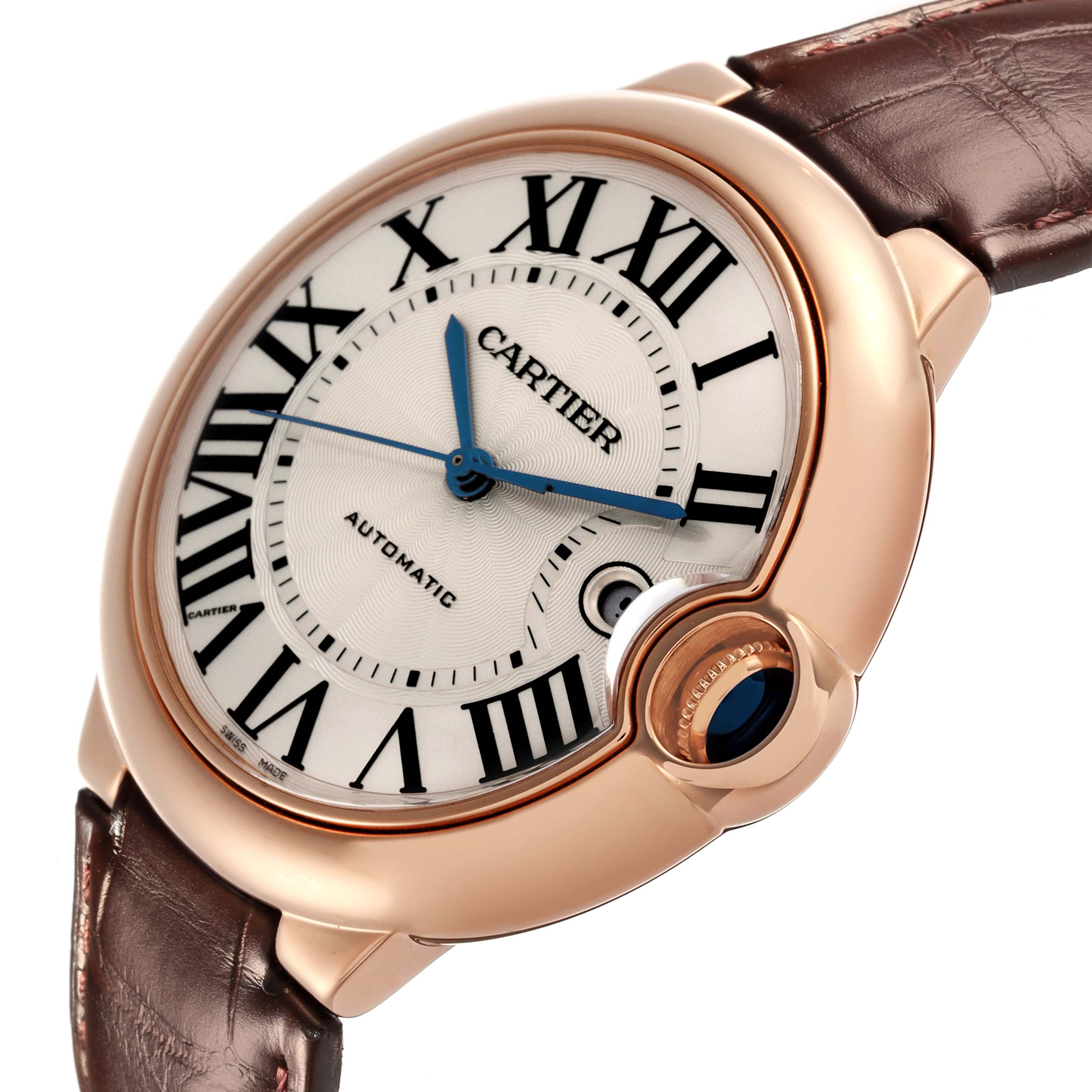 This image shows a Cartier Ballon Bleu W69000651 Men
s Rose Gold Silver Dial W69000651 Men
s Rose Gold Silver Dial watch at an angle highlighting the face, Roman numerals, and part of the leather strap.