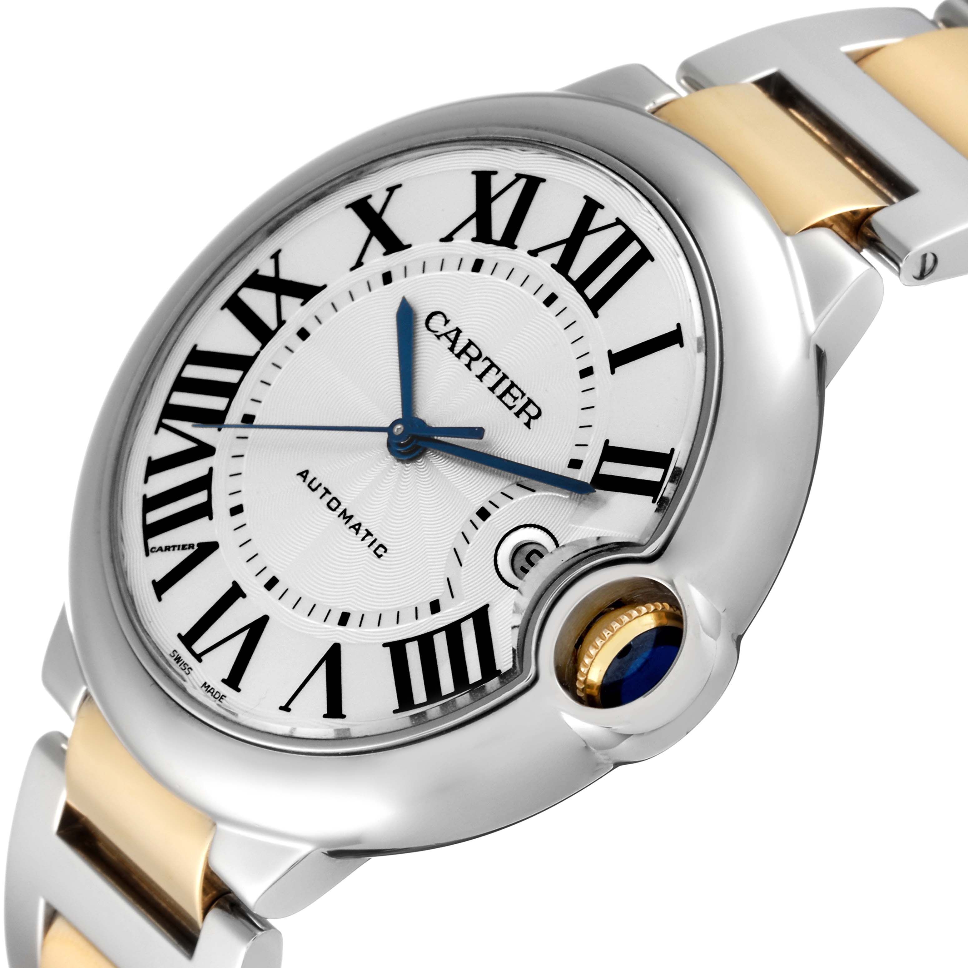 The image shows a close-up angle of the Cartier Ballon Bleu W69009Z3 Men's Steel and Gold (two tone) Silver Dial W69009Z3 Men's Steel and Gold (two tone) Silver Dial watch, displaying its face, crown, and part of the bracelet.