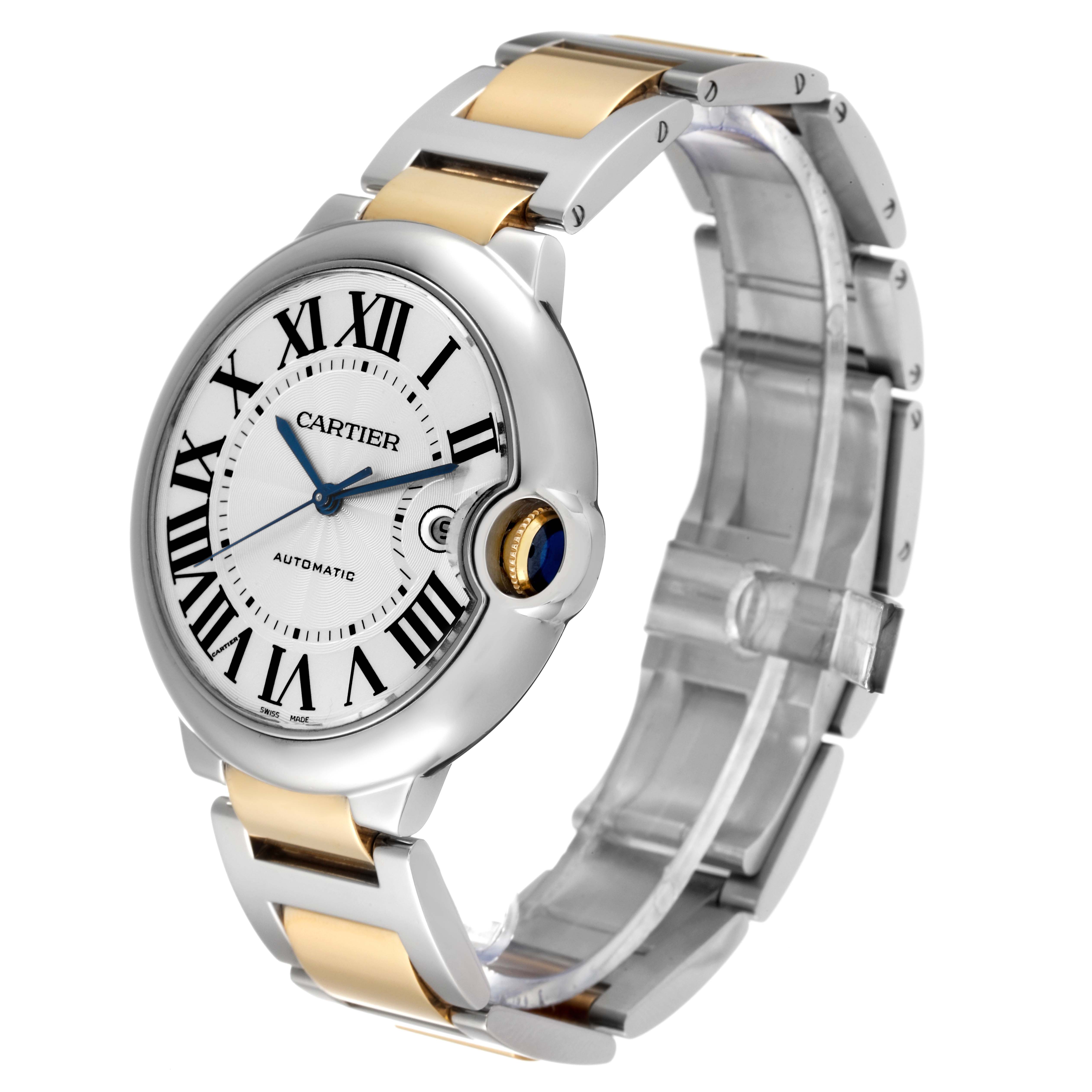 This image shows a side angle of the Cartier Ballon Bleu W69009Z3 Men's Steel and Gold (two tone) Silver Dial W69009Z3 Men's Steel and Gold (two tone) Silver Dial watch, highlighting its face, crown, and two-toned bracelet.