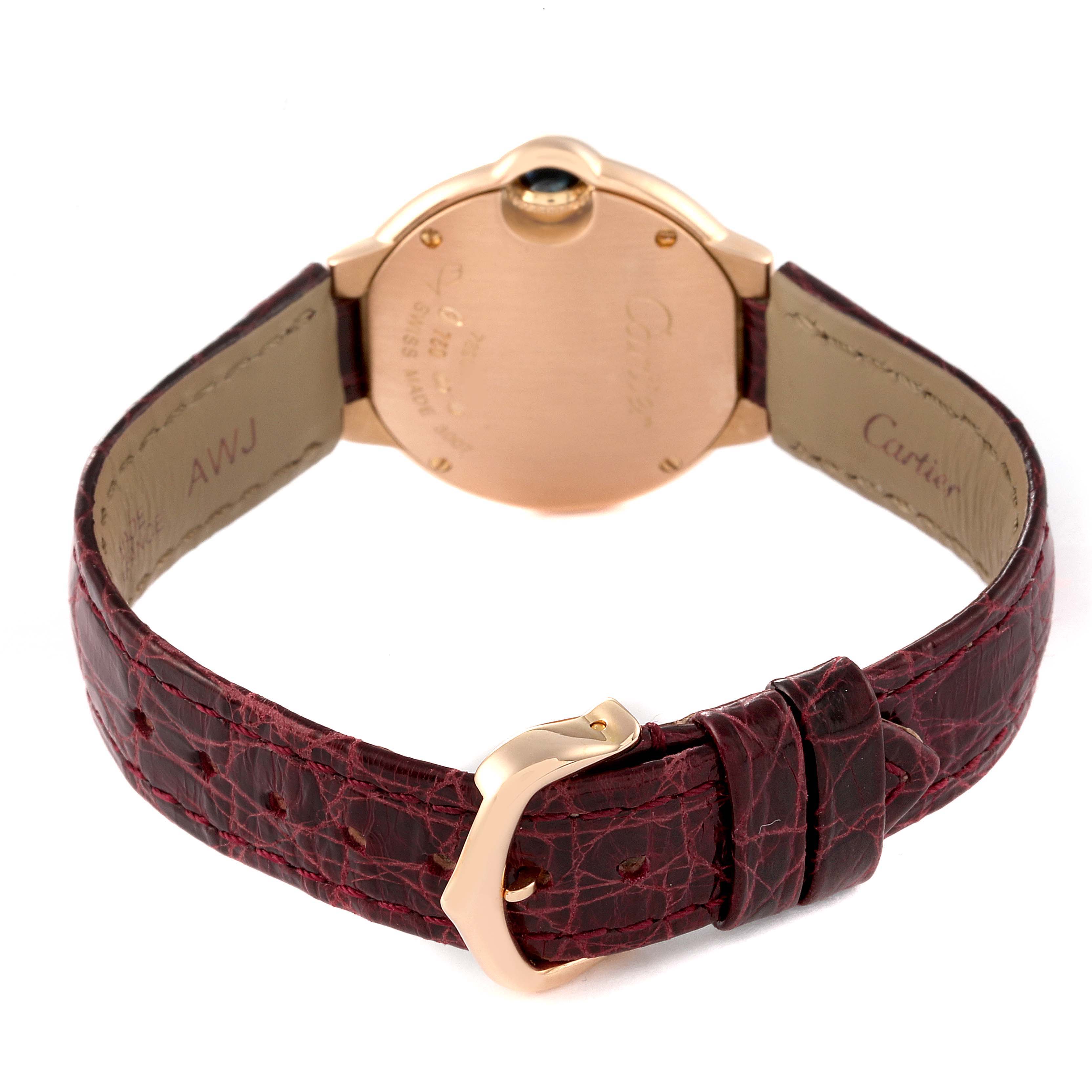 This image shows the back view of a Cartier Ballon Bleu W6900256 Women's Rose Gold Silver Dial W6900256 Women's Rose Gold Silver Dial watch, highlighting its case back and burgundy leather strap with a buckle.