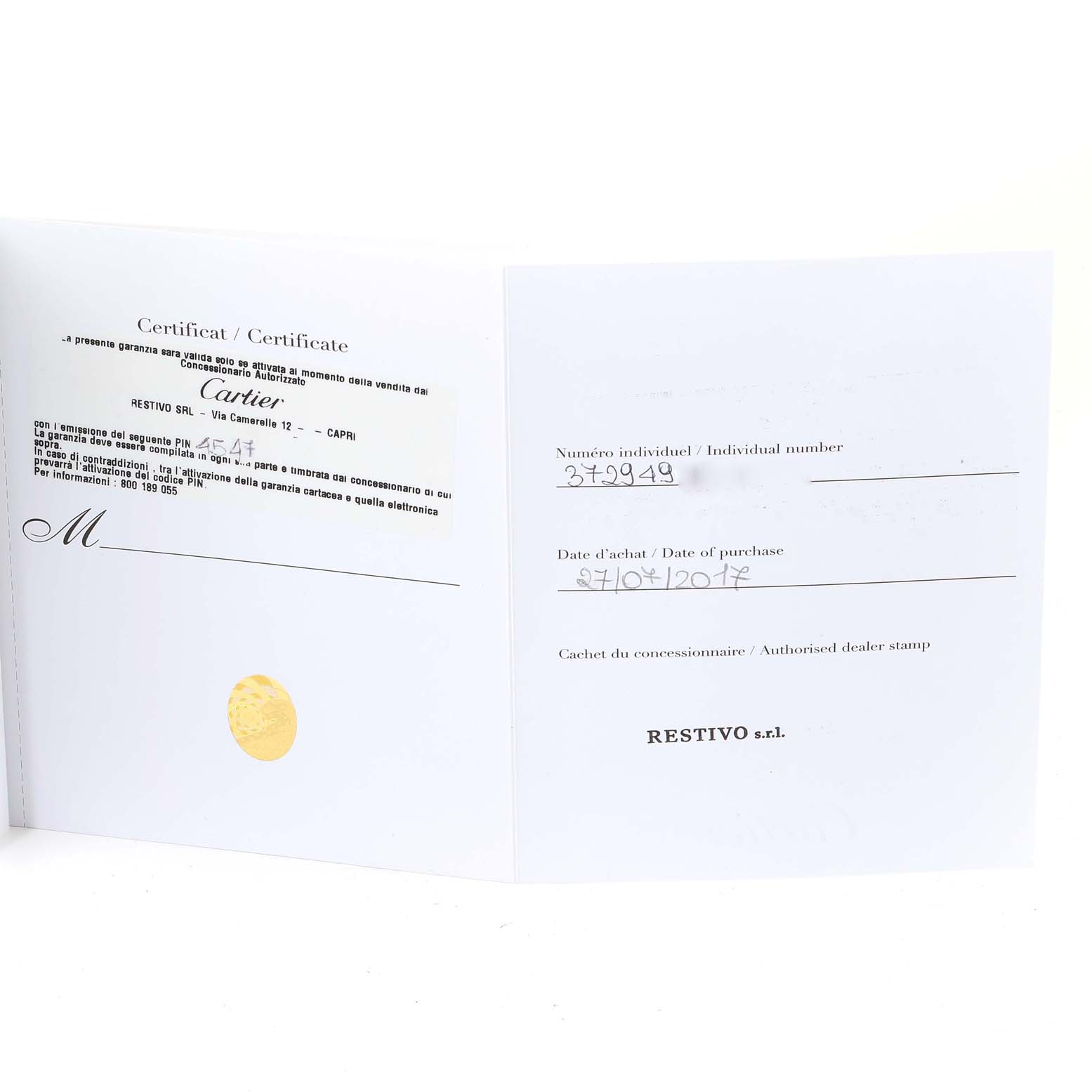 The image shows the certificate and purchase documentation for the Calibre de Cartier watch by Cartier.