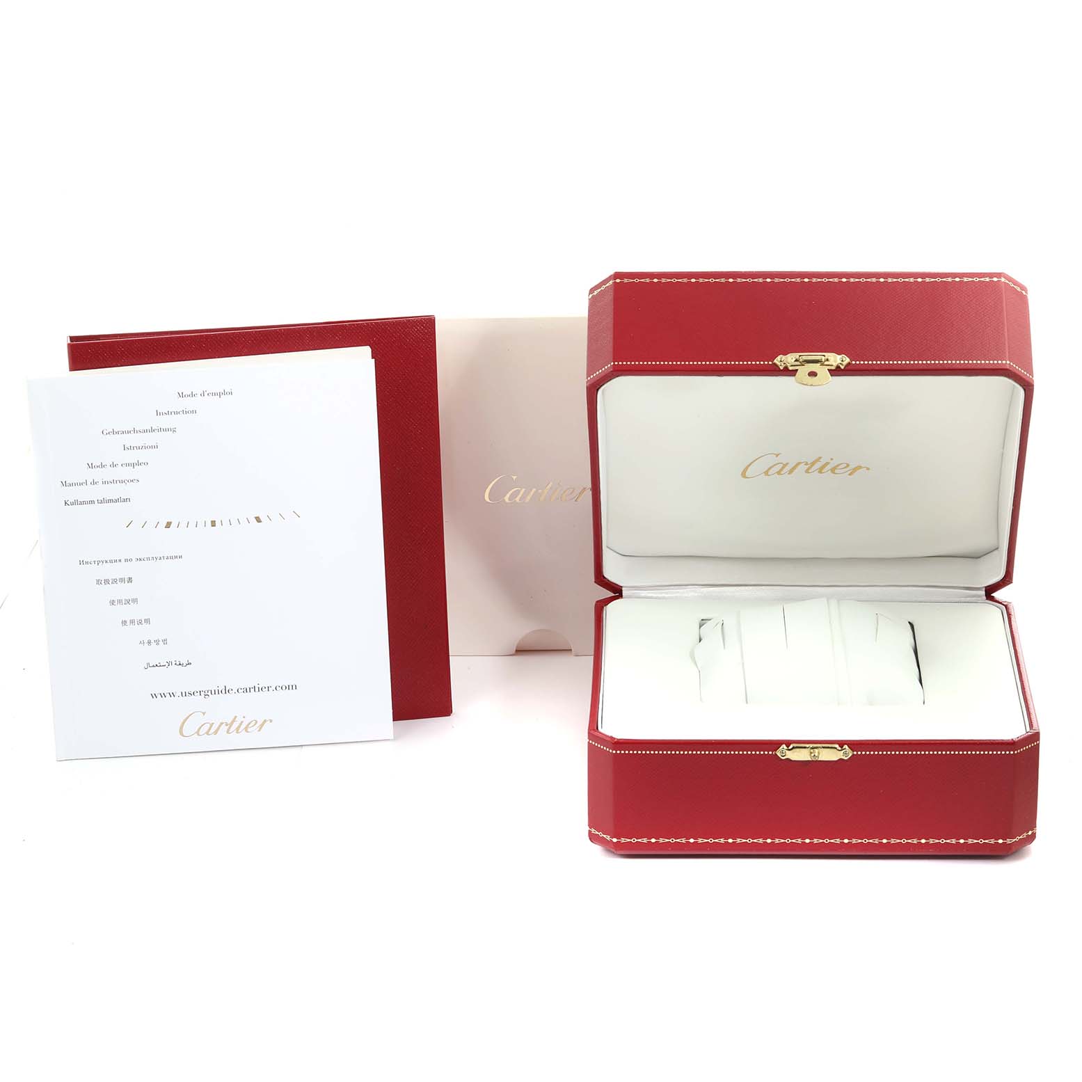 The image shows the box and manuals for the Cartier Roadster W62025V3 Men's Stainless Steel Silver Dial W62025V3 Men's Stainless Steel Silver Dial watch, including a red case and instruction booklets.