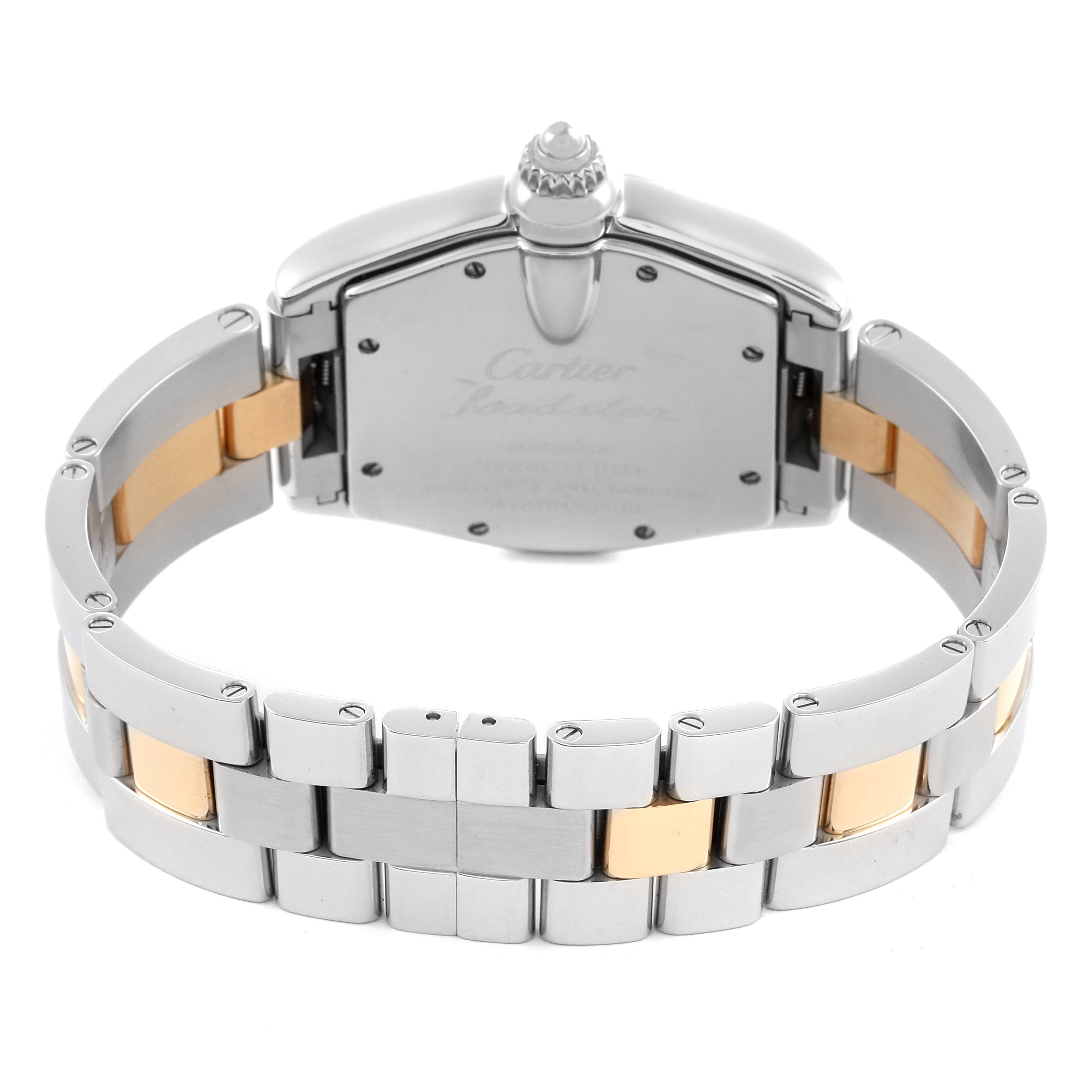 The Cartier Roadster W62031Y4 Men's Steel and Gold (two tone) Silver Dial W62031Y4 Men's Steel and Gold (two tone) Silver Dial watch is shown from the back, highlighting the metal case and part of the two-tone bracelet.