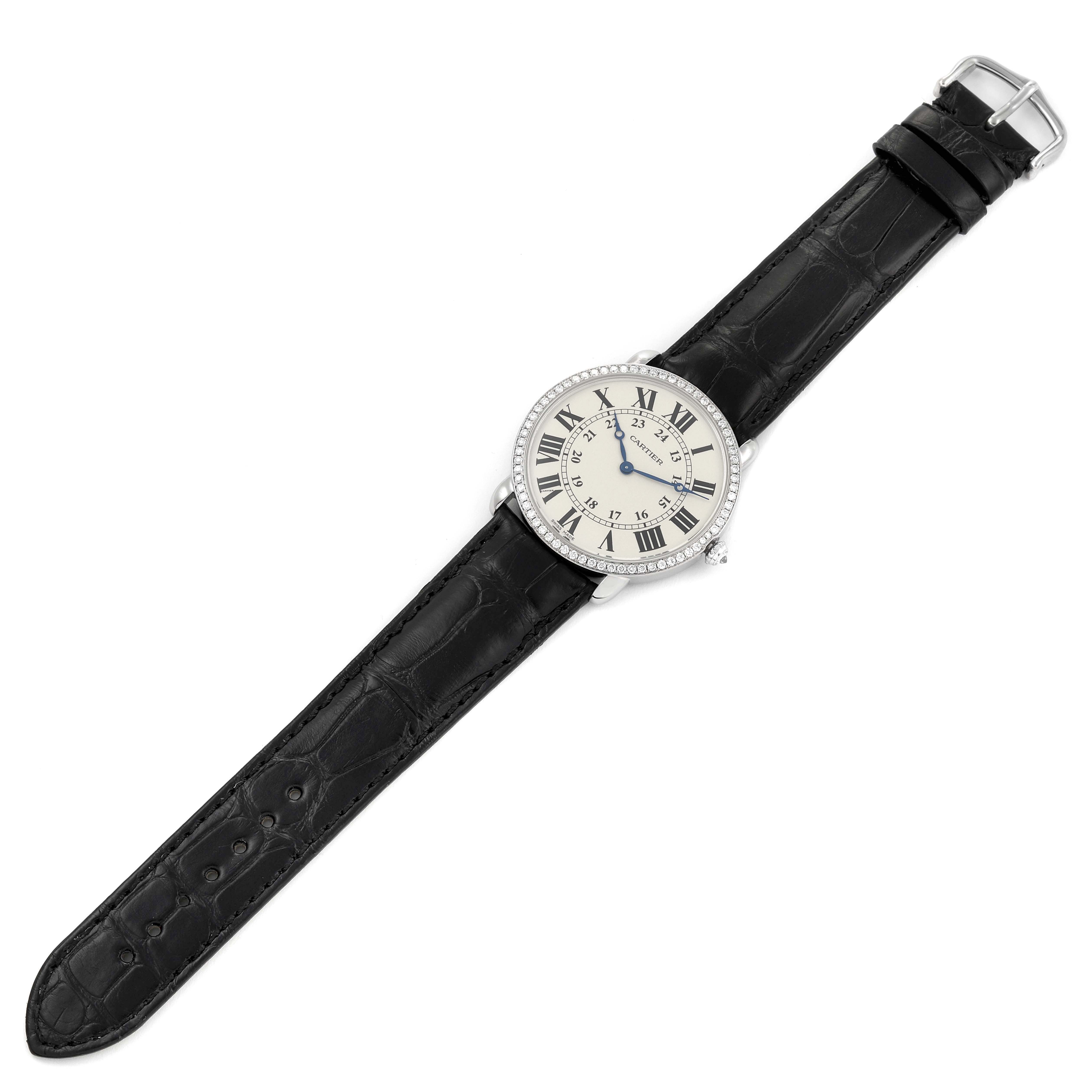 The Cartier Ronde WR000551 Women's White Gold Silver Dial watch is shown from a top-down angle displaying the entire face, bezel, and black leather strap.