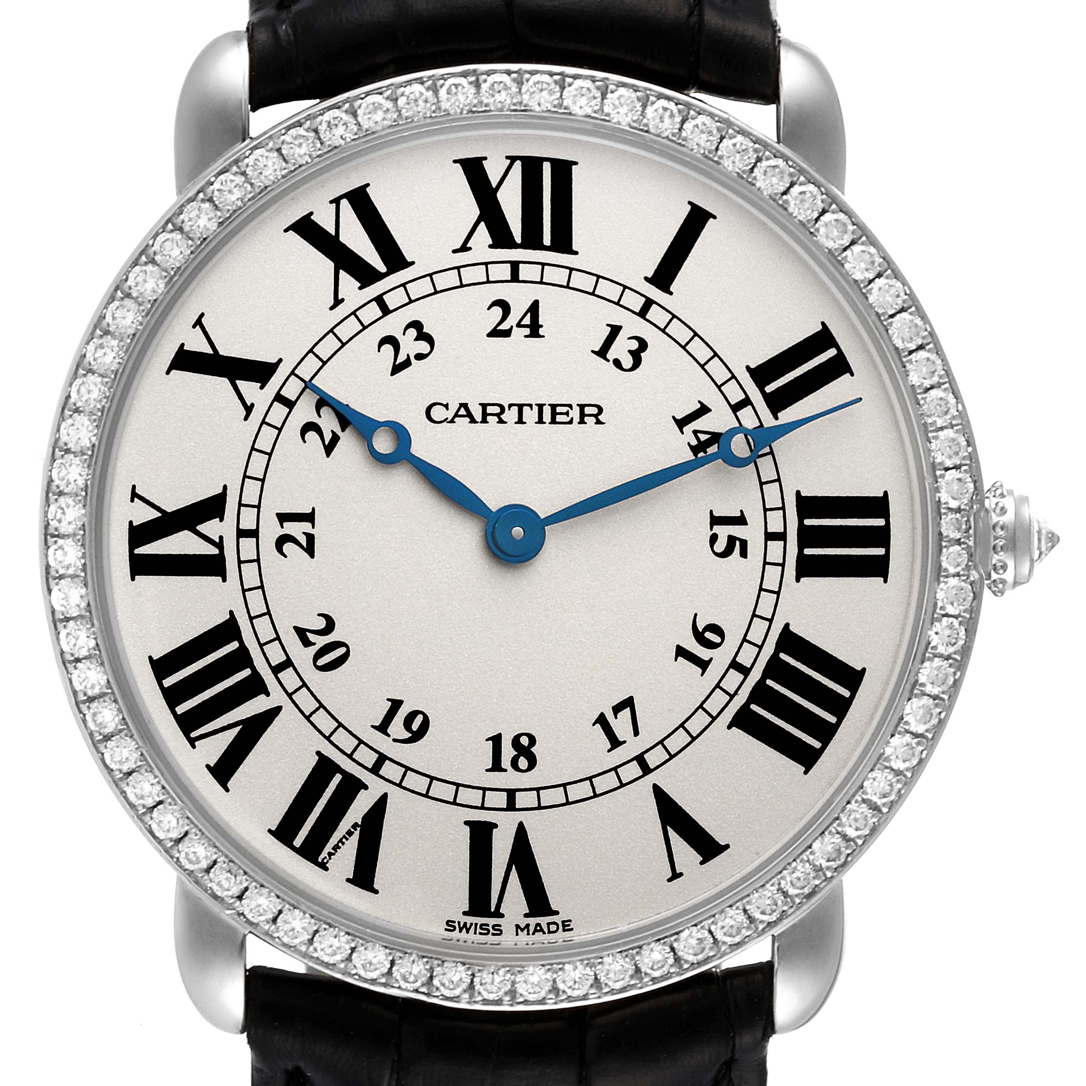 The image shows a close-up of the Cartier Ronde model watch dial with Roman numerals, blue hands, and surrounding diamond bezel.
