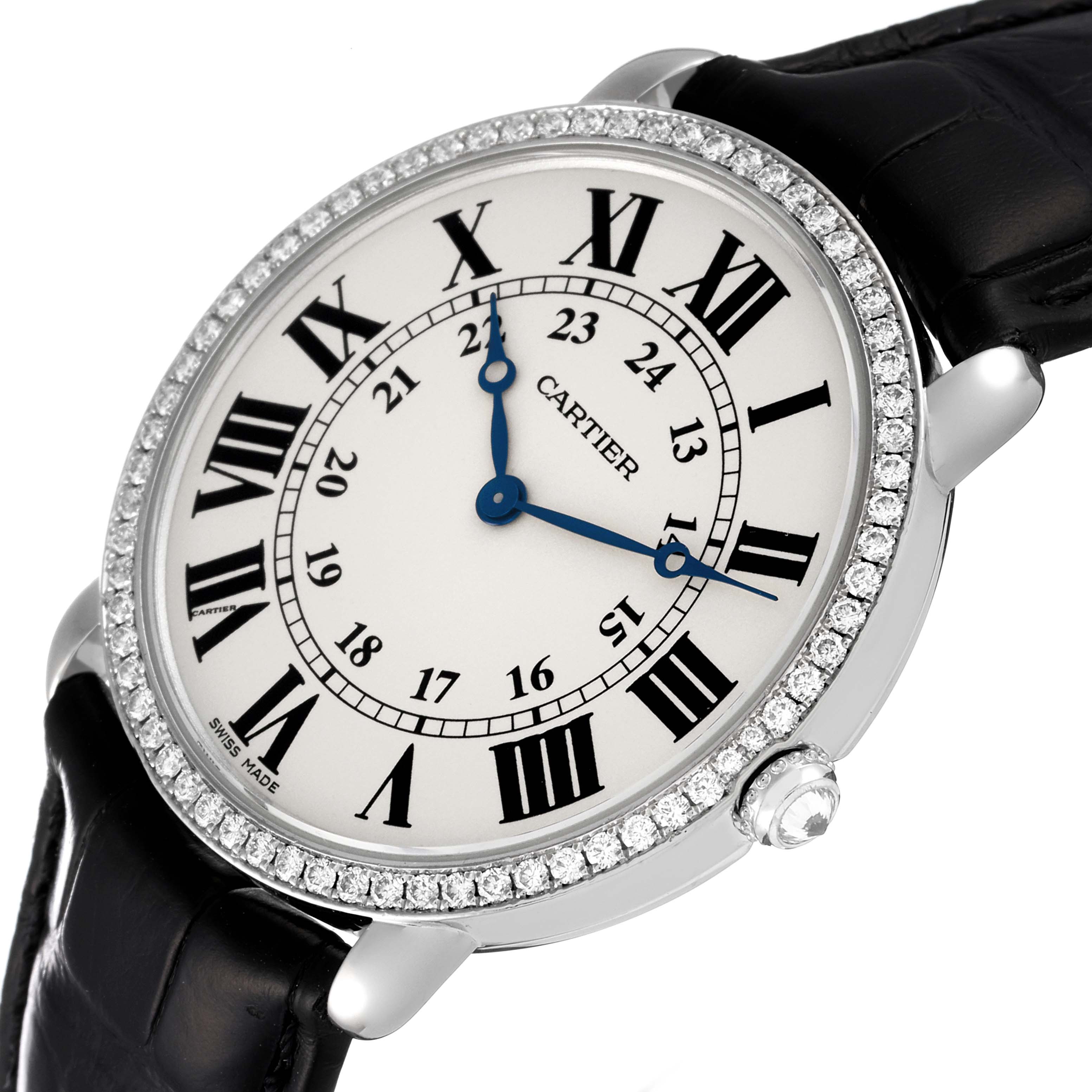 The image shows a Ronde Cartier watch at a slight angle, displaying its face, diamond bezel, blue hands, and black leather strap.