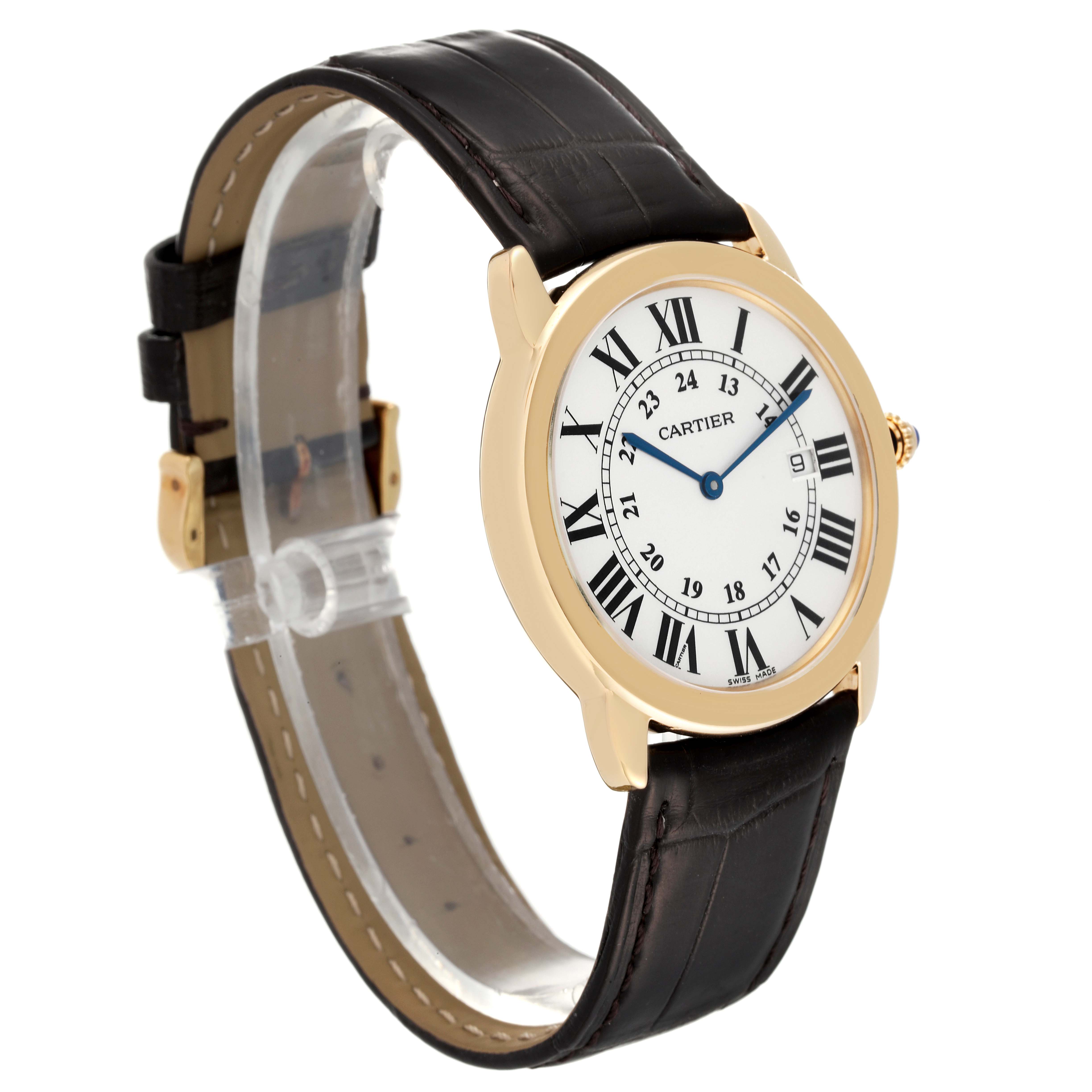 This image shows a Cartier Ronde W6700455 Men's Yellow Gold Silver Dial W6700455 Men's Yellow Gold Silver Dial model watch at a slightly tilted side angle, featuring its round face and leather strap.