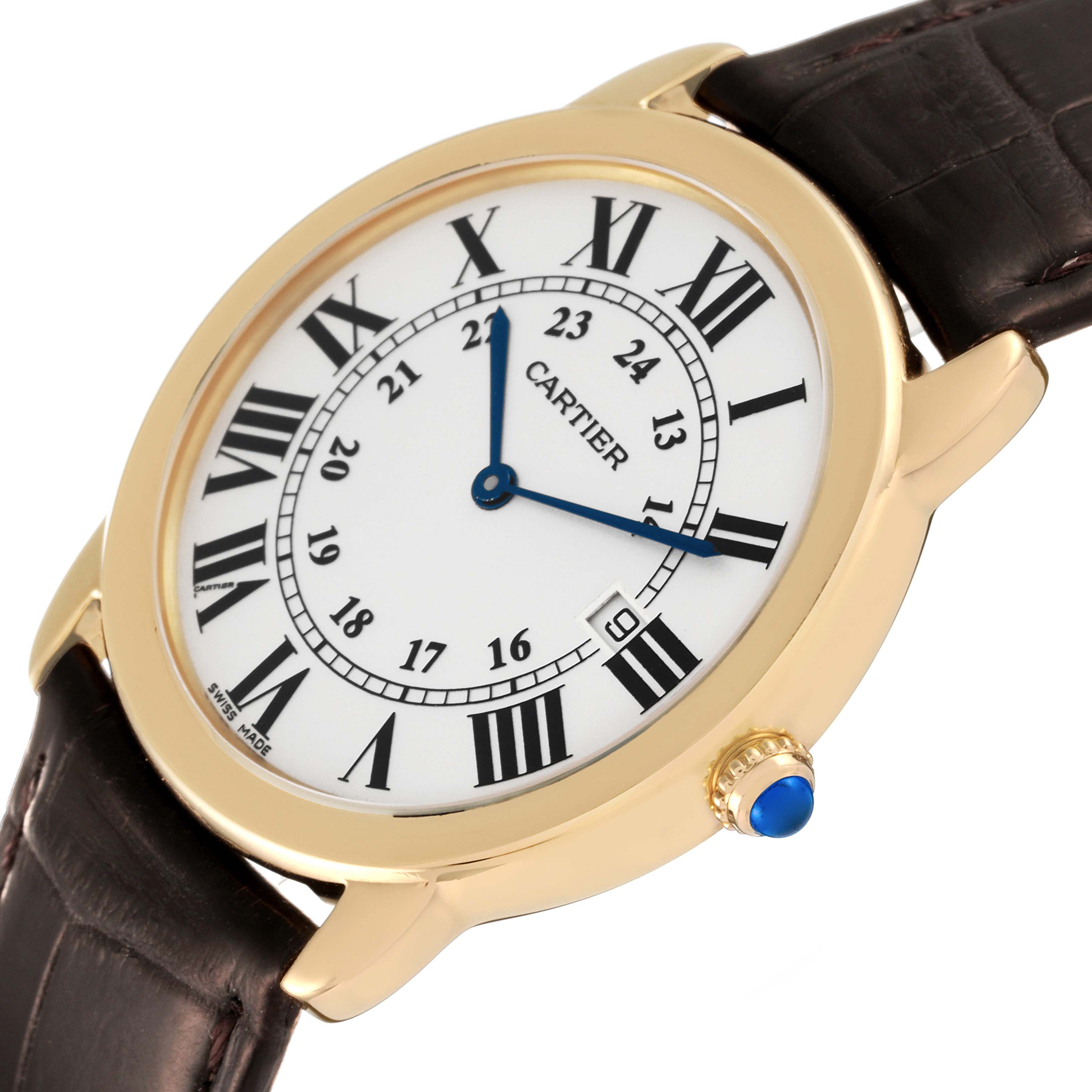 This image shows a close-up angled view of the Cartier Ronde W6700455 Men's Yellow Gold Silver Dial W6700455 Men's Yellow Gold Silver Dial model watch, featuring its dial and part of the leather strap.