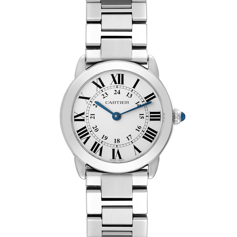 The Cartier Ronde watch is shown from the front, displaying its round face, Roman numerals, and silver metal bracelet.