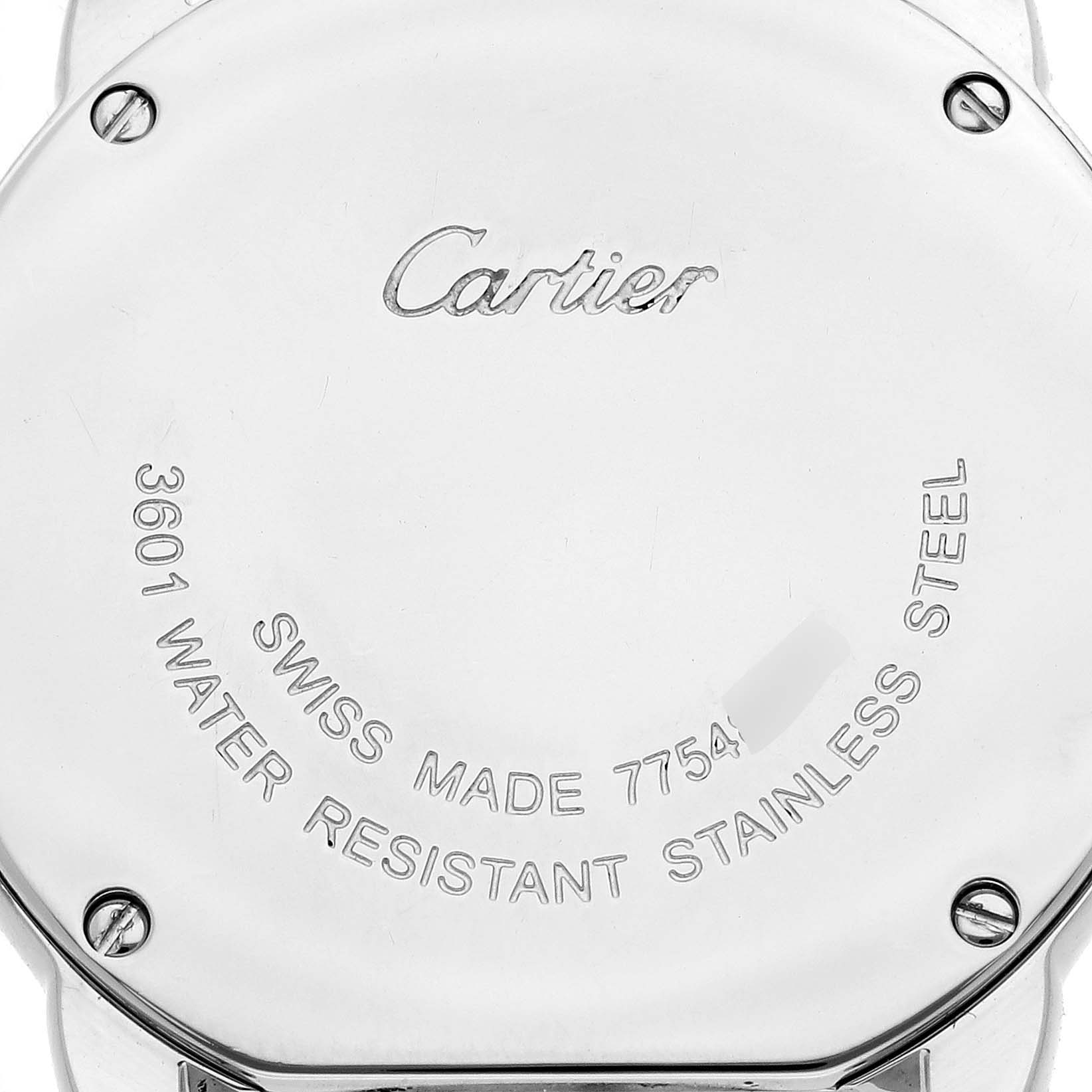 The image shows the back of a Cartier Ronde W6701004 Women's Stainless Steel Silver Dial W6701004 Women's Stainless Steel Silver Dial watch, featuring engravings and screws.