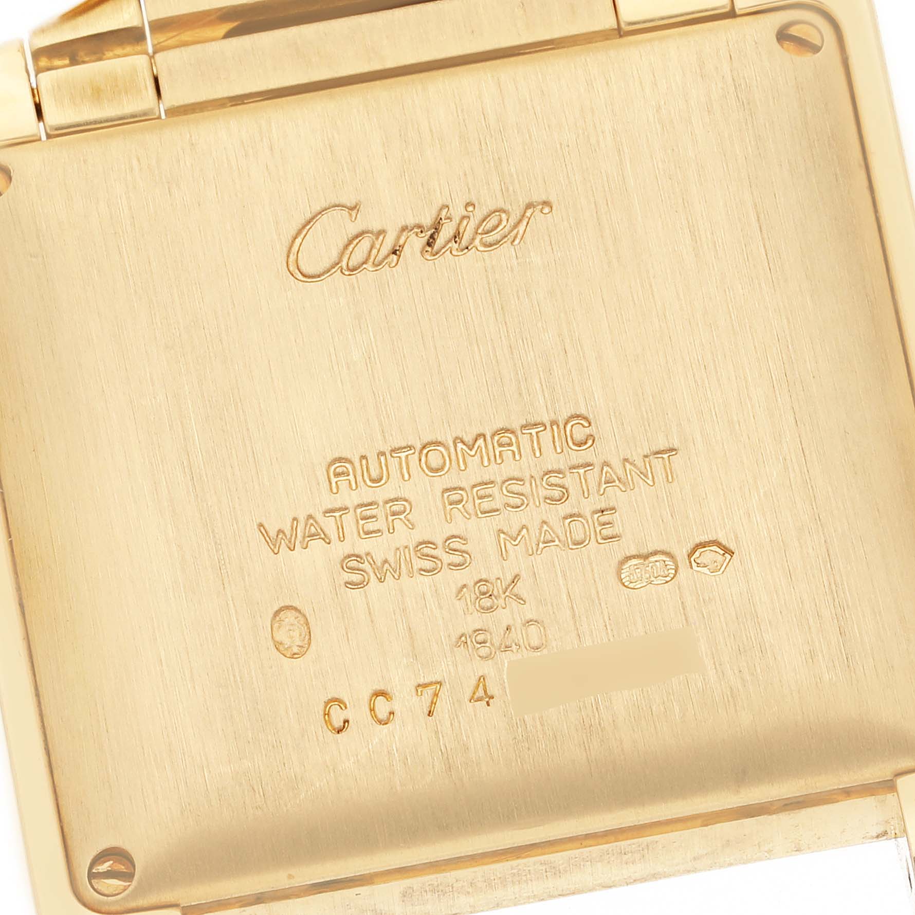 This is the back view of a Cartier Tank Francaise W50001R2 Men
s Yellow Gold Silver Dial W50001R2 Men
s Yellow Gold Silver Dial watch, showing the brand name and specifications engraved on the case.