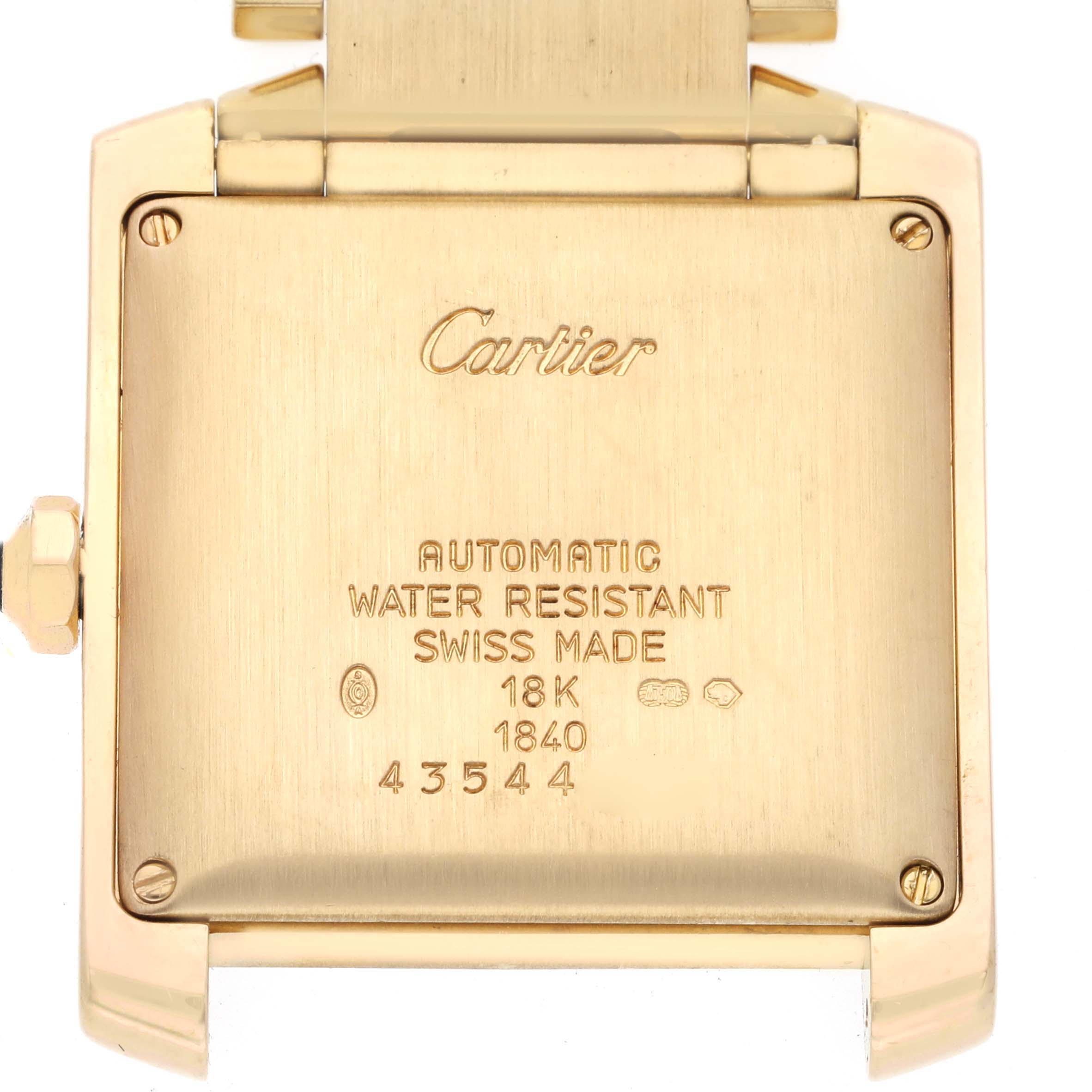 This image shows the back case of the Cartier Tank Française watch, displaying inscriptions and material details.