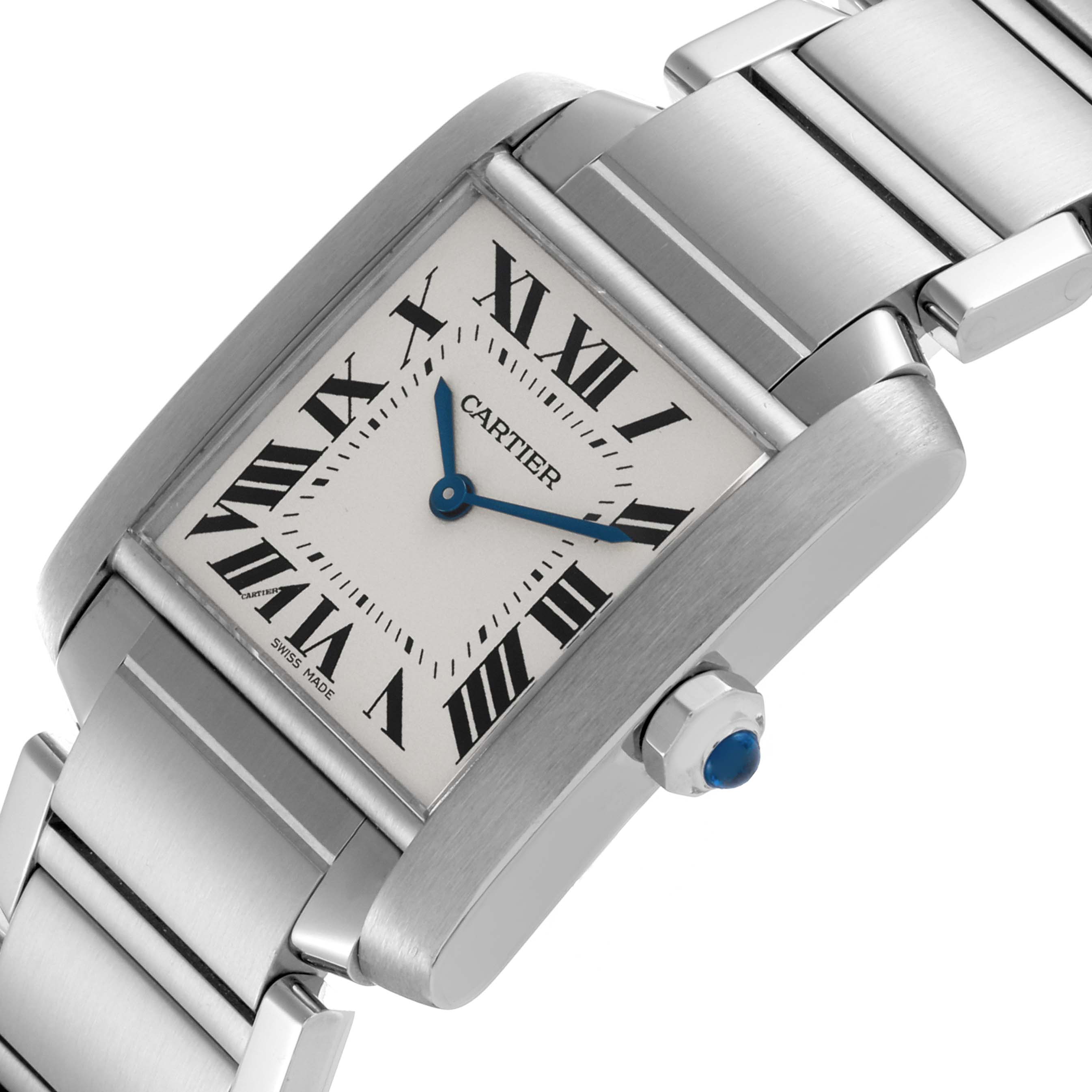 The Cartier Tank Française watch is shown at an angle emphasizing the face, crown, and bracelet.