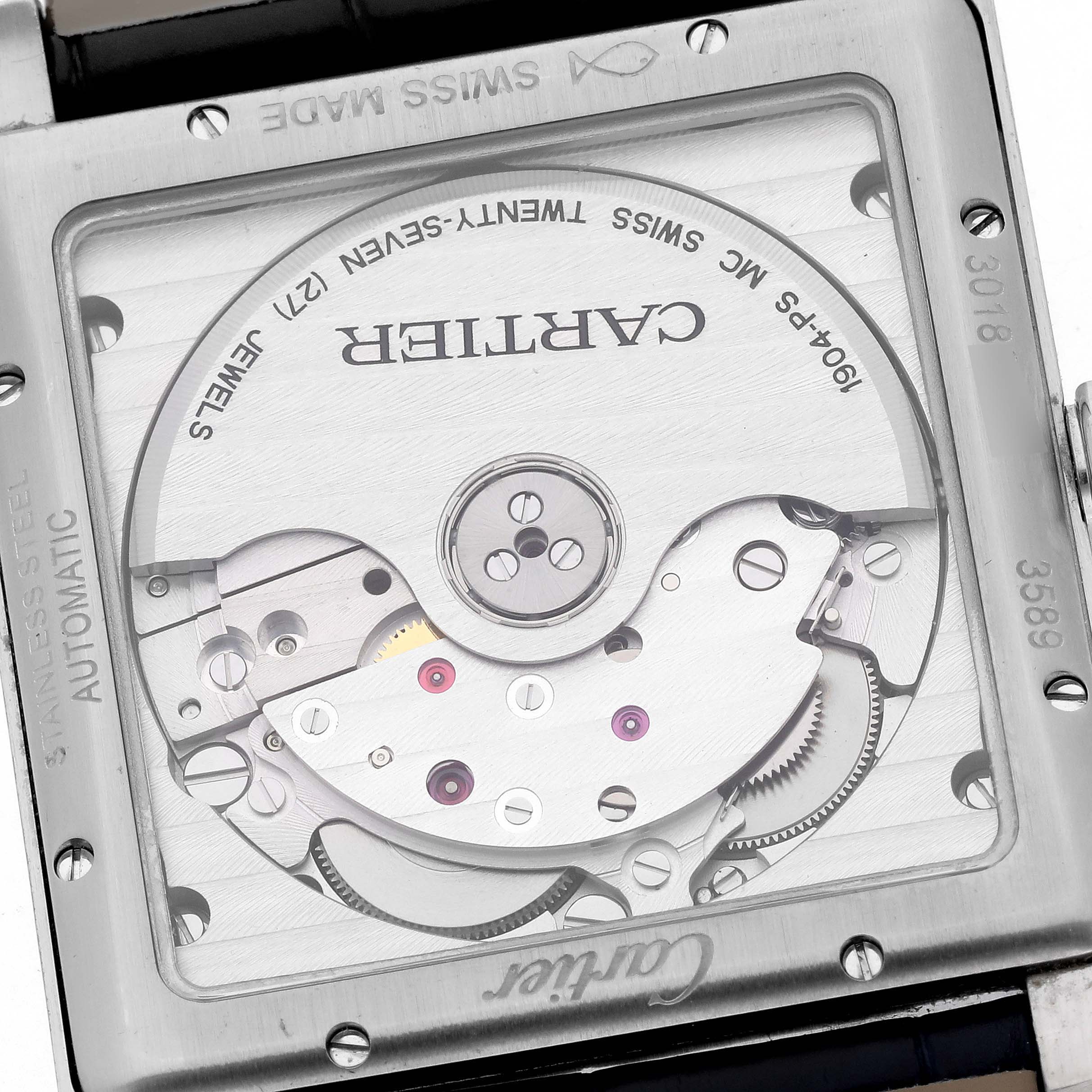 The image shows the back of a Cartier Tank MC WSTA0010 Men's Stainless Steel Blue Dial WSTA0010 Men's Stainless Steel Blue Dial, highlighting its automatic movement and intricate mechanical parts.