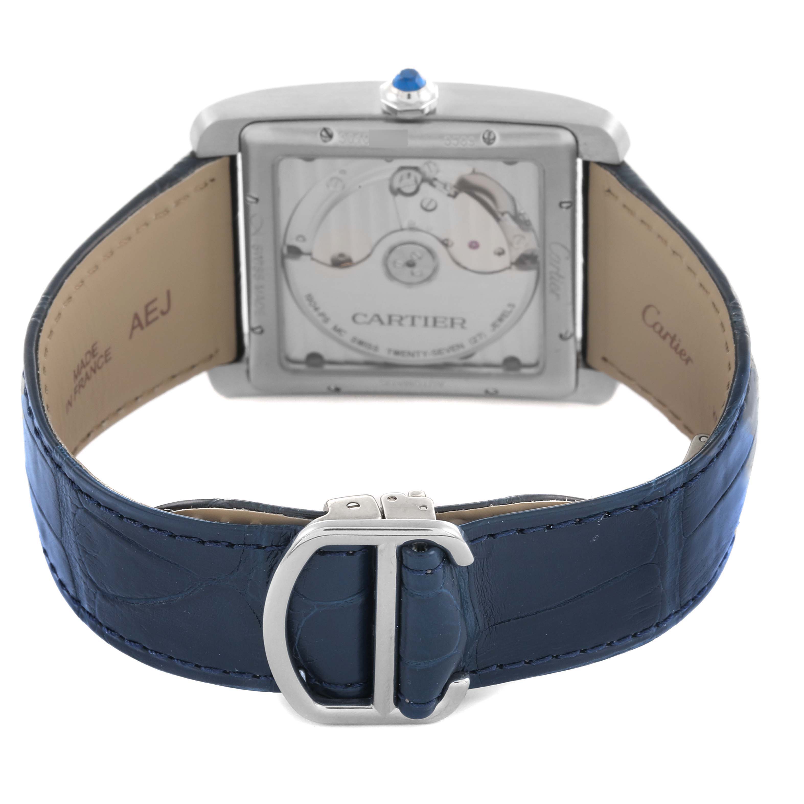 The image shows the back of the Cartier Tank MC WSTA0010 Men's Stainless Steel Blue Dial WSTA0010 Men's Stainless Steel Blue Dial watch, highlighting the movement and blue strap with clasp.