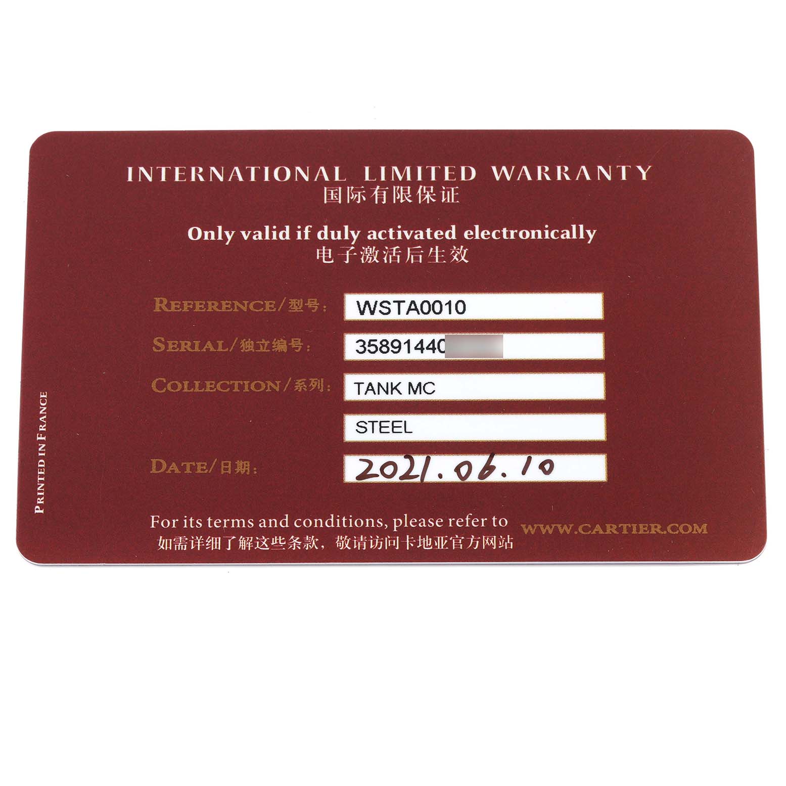 The image shows an International Limited Warranty card for the Cartier Tank MC WSTA0010 Men's Stainless Steel Blue Dial WSTA0010 Men's Stainless Steel Blue Dial watch.
