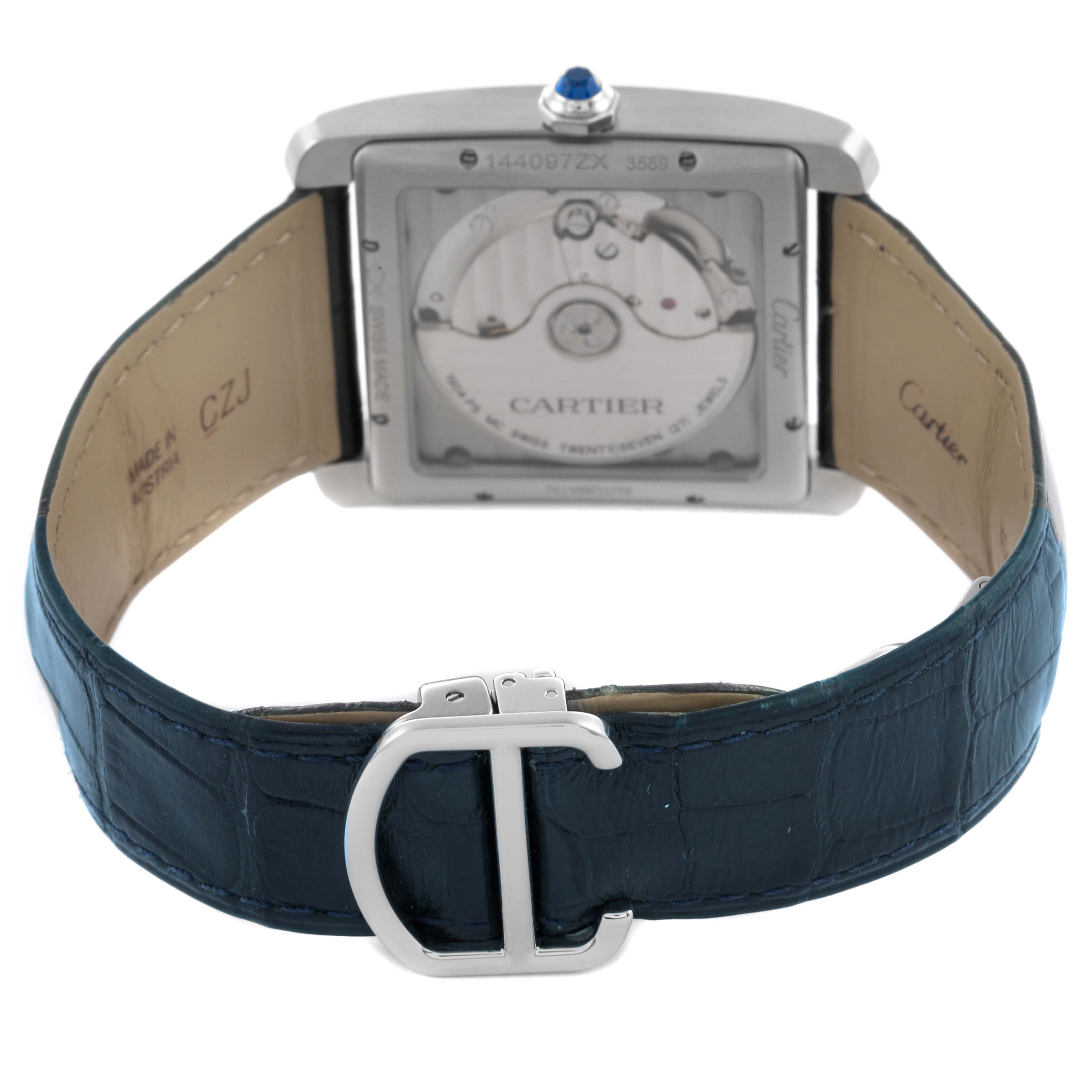 The Cartier Tank MC WSTA0010 Men's Stainless Steel Blue Dial WSTA0010 Men's Stainless Steel Blue Dial watch is shown from the back, displaying its movement and blue leather strap with a buckle.