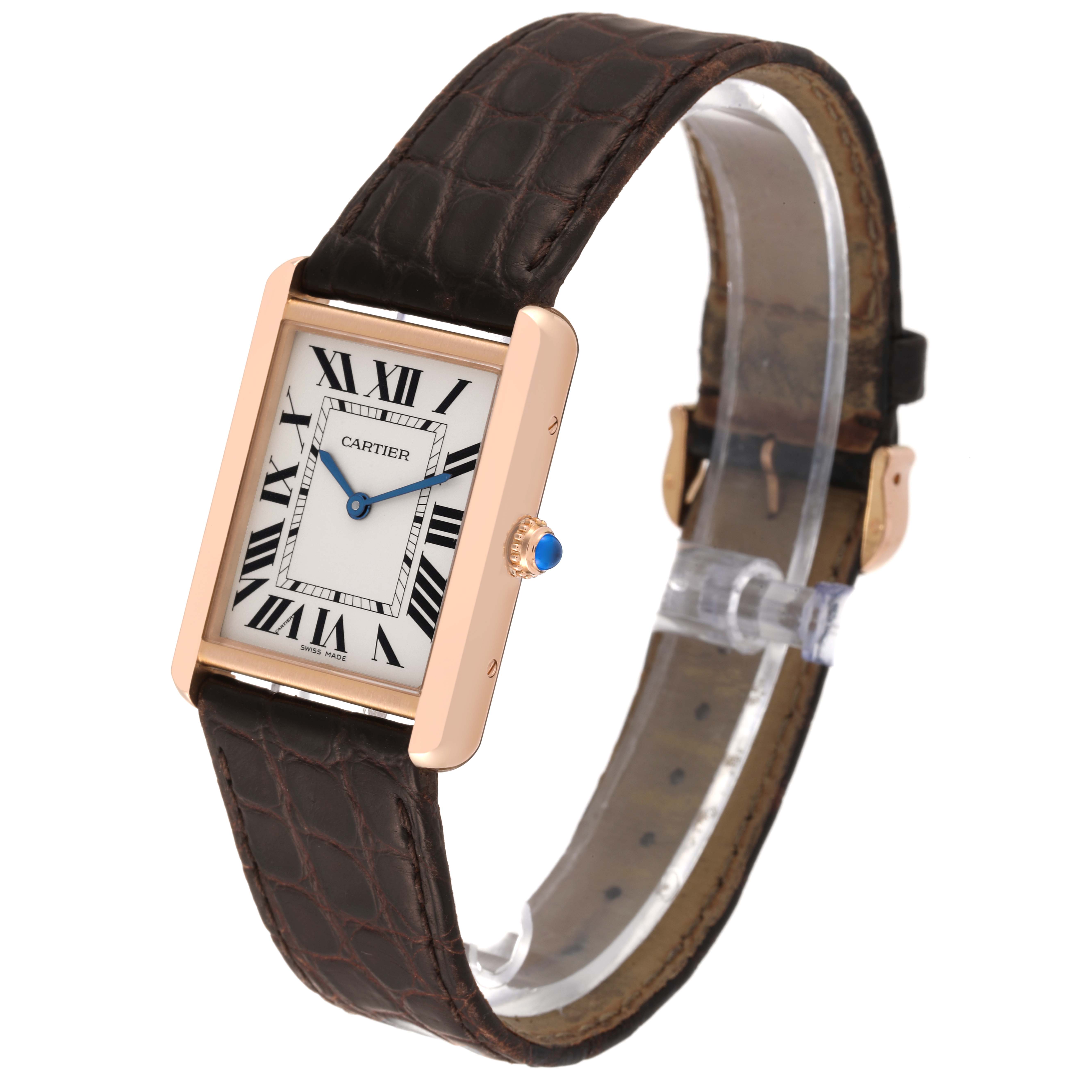 The image shows a Cartier Tank Solo W5200025 Men
s Rose Gold Silver Dial W5200025 Men
s Rose Gold Silver Dial watch from an angled side view, highlighting its rectangular face and leather strap.
