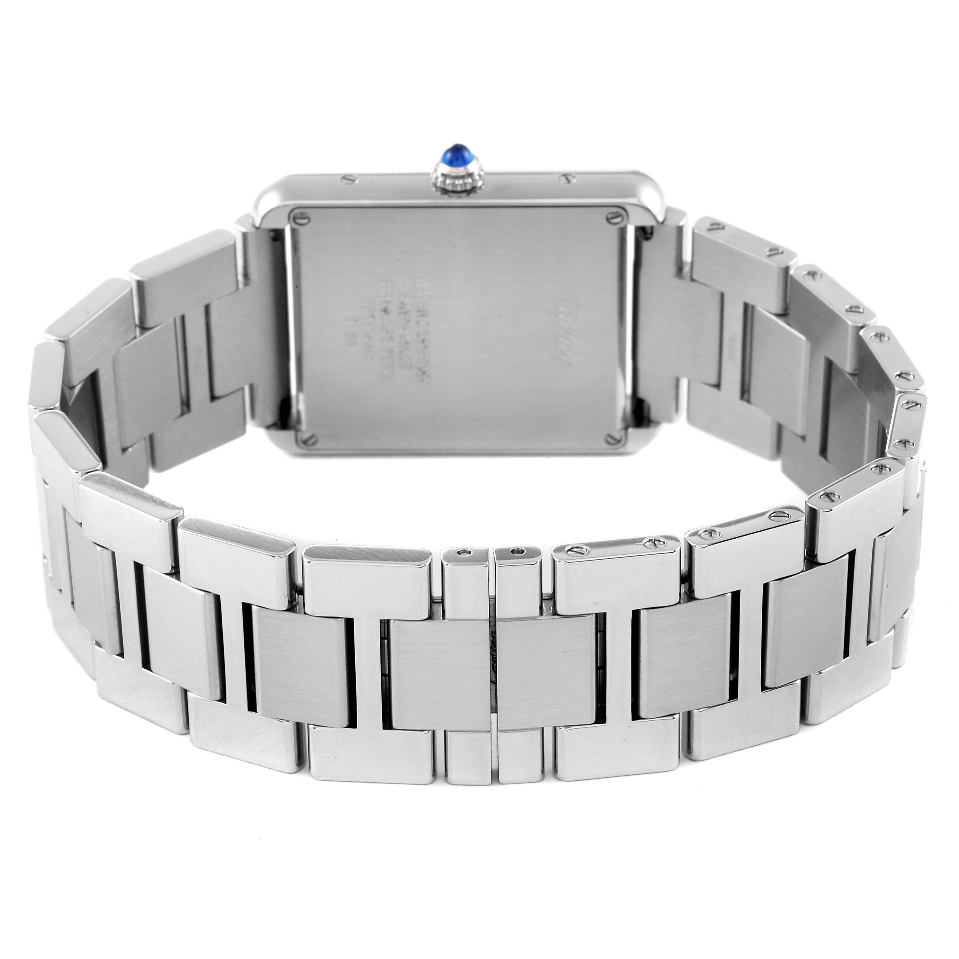 The image shows the back of a Cartier Tank Solo W5200014 Men's Stainless Steel Silver Dial W5200014 Men's Stainless Steel Silver Dial watch, featuring its stainless steel bracelet and crown.