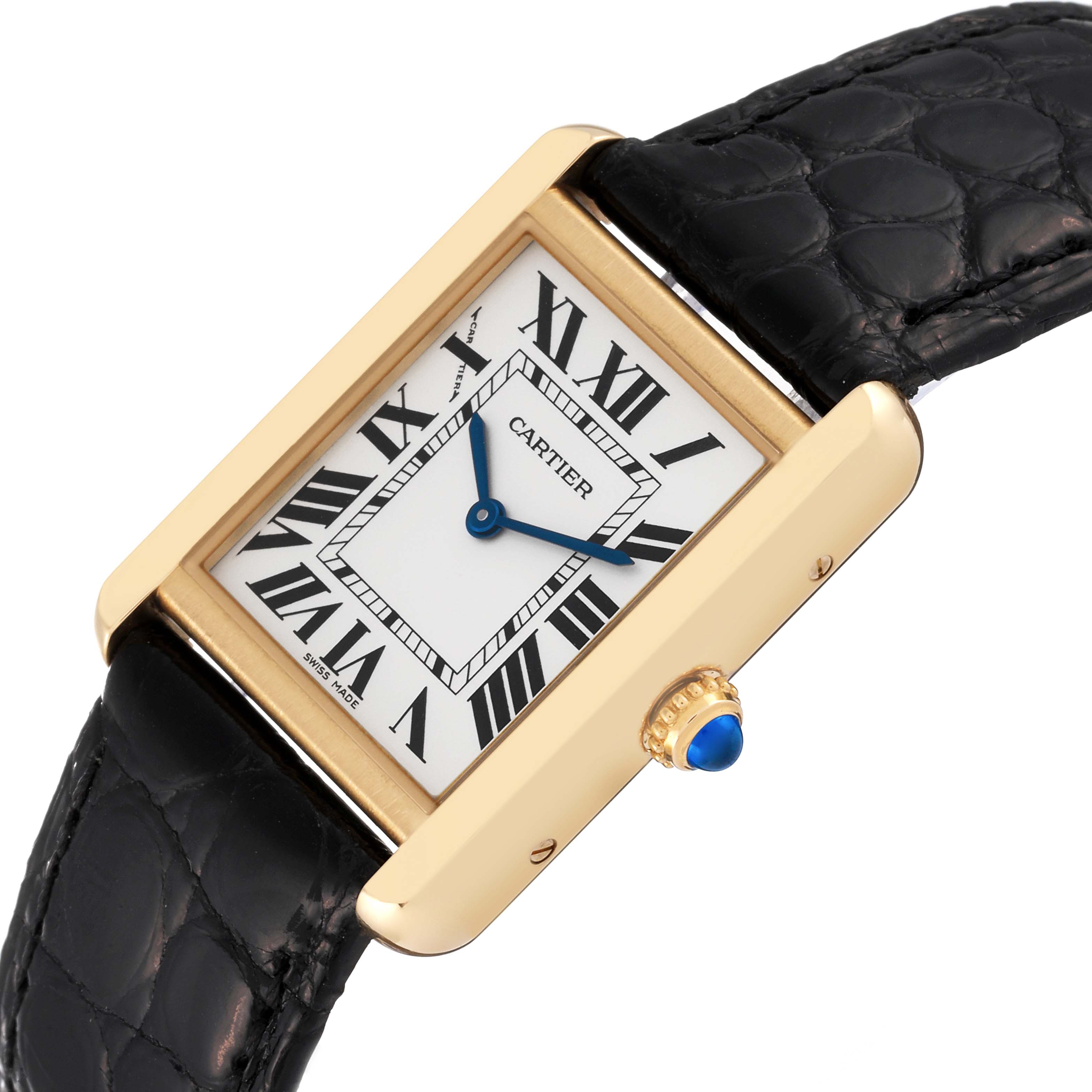 The Cartier Tank Solo W5200002 Women's Yellow Gold Silver Dial W5200002 Women's Yellow Gold Silver Dial watch is shown from an angled perspective, displaying its face, crown, and part of its leather strap.