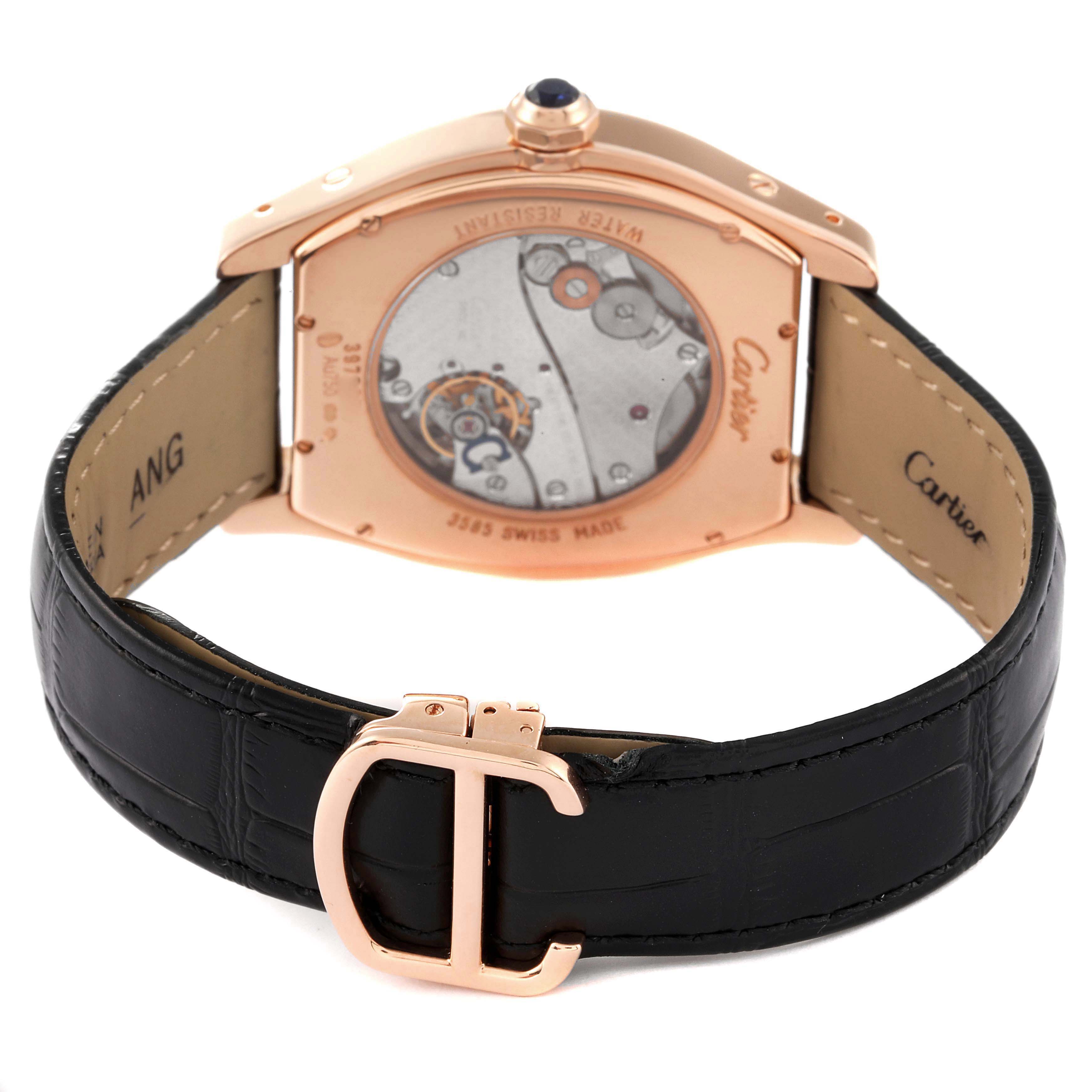 This image shows the back view of the Tortue model watch by Cartier, highlighting the transparent case back and strap.