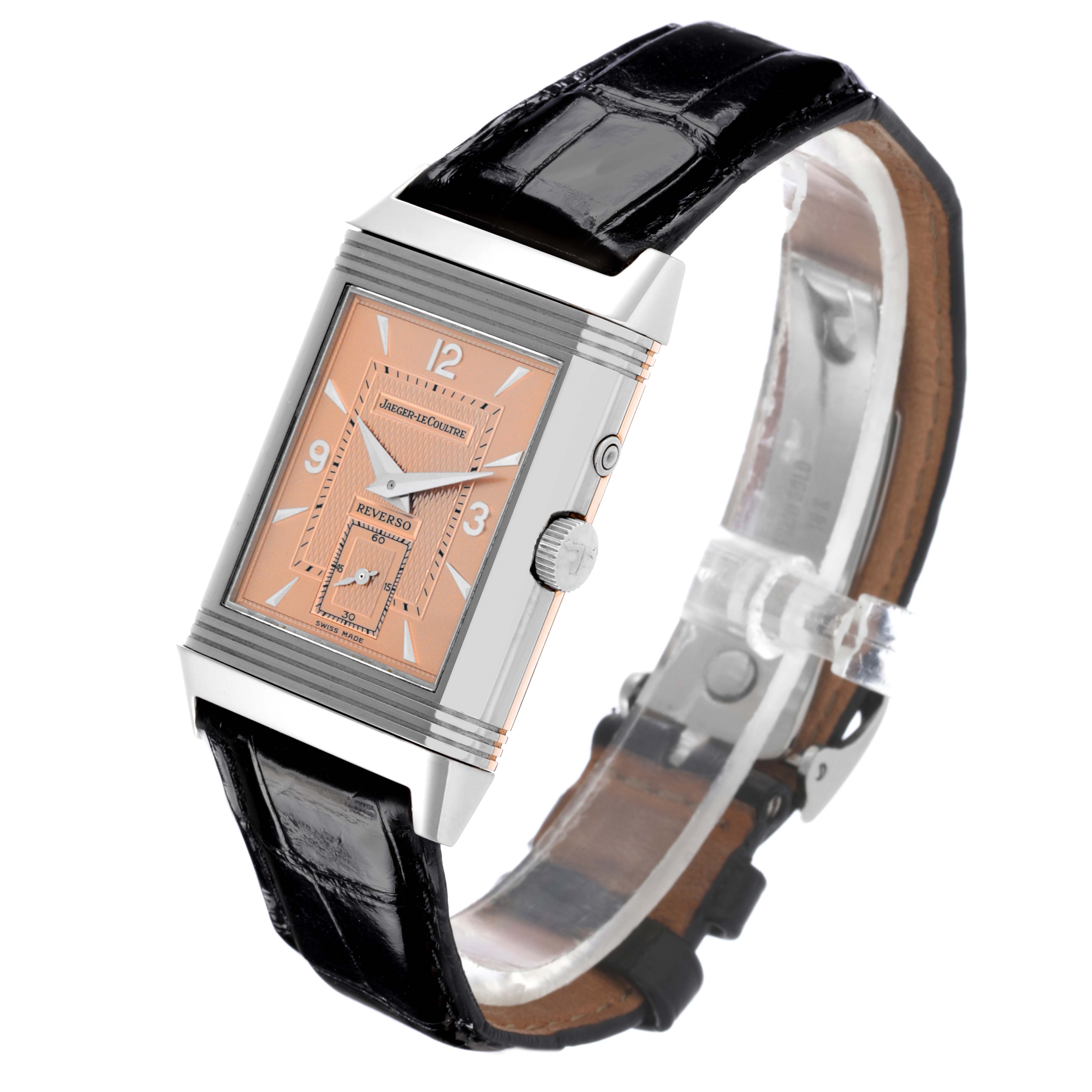 The Jaeger-LeCoultre Reverso watch is shown at a slight angle, highlighting the face, case, crown, and strap.