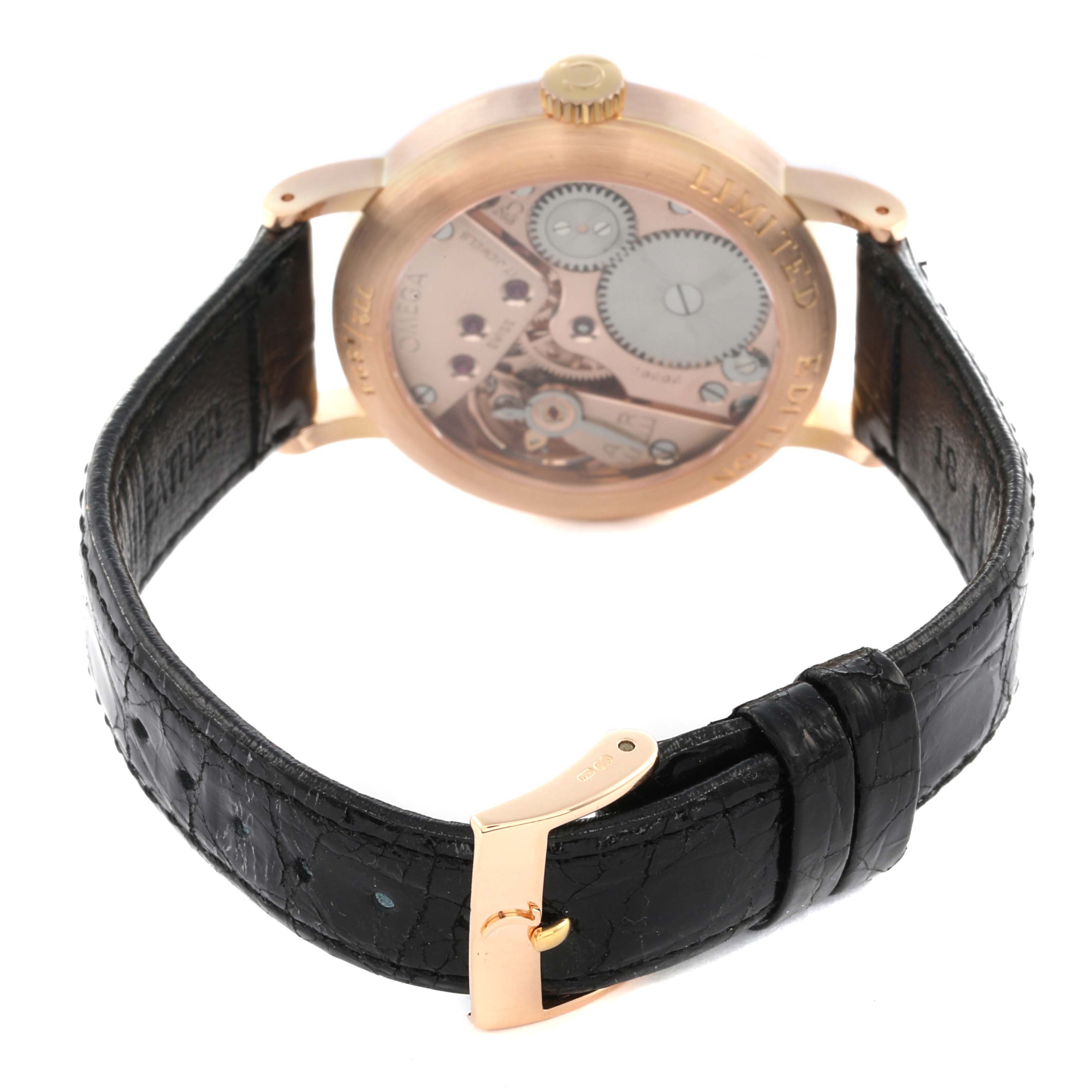 The Omega Museum 5950.30.03 Men's Rose Gold Champagne Dial 5950.30.03 Men's Rose Gold Champagne Dial watch is shown from the back, displaying the movement, case, and a black leather strap with a clasp.