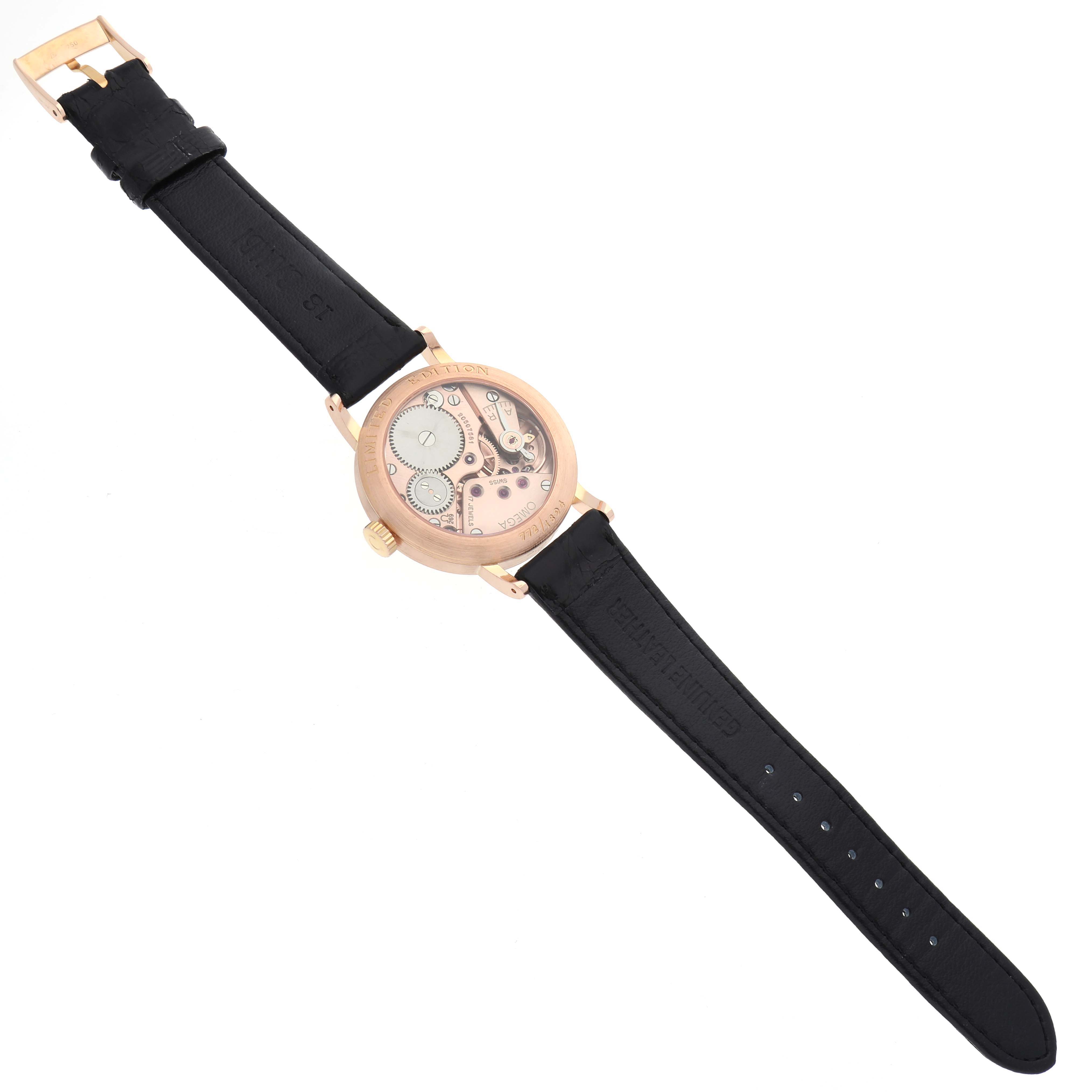 The Omega Museum 5950.30.03 Men's Rose Gold Champagne Dial 5950.30.03 Men's Rose Gold Champagne Dial model is pictured from a top view, showcasing its dial, rose gold case, and black leather strap.