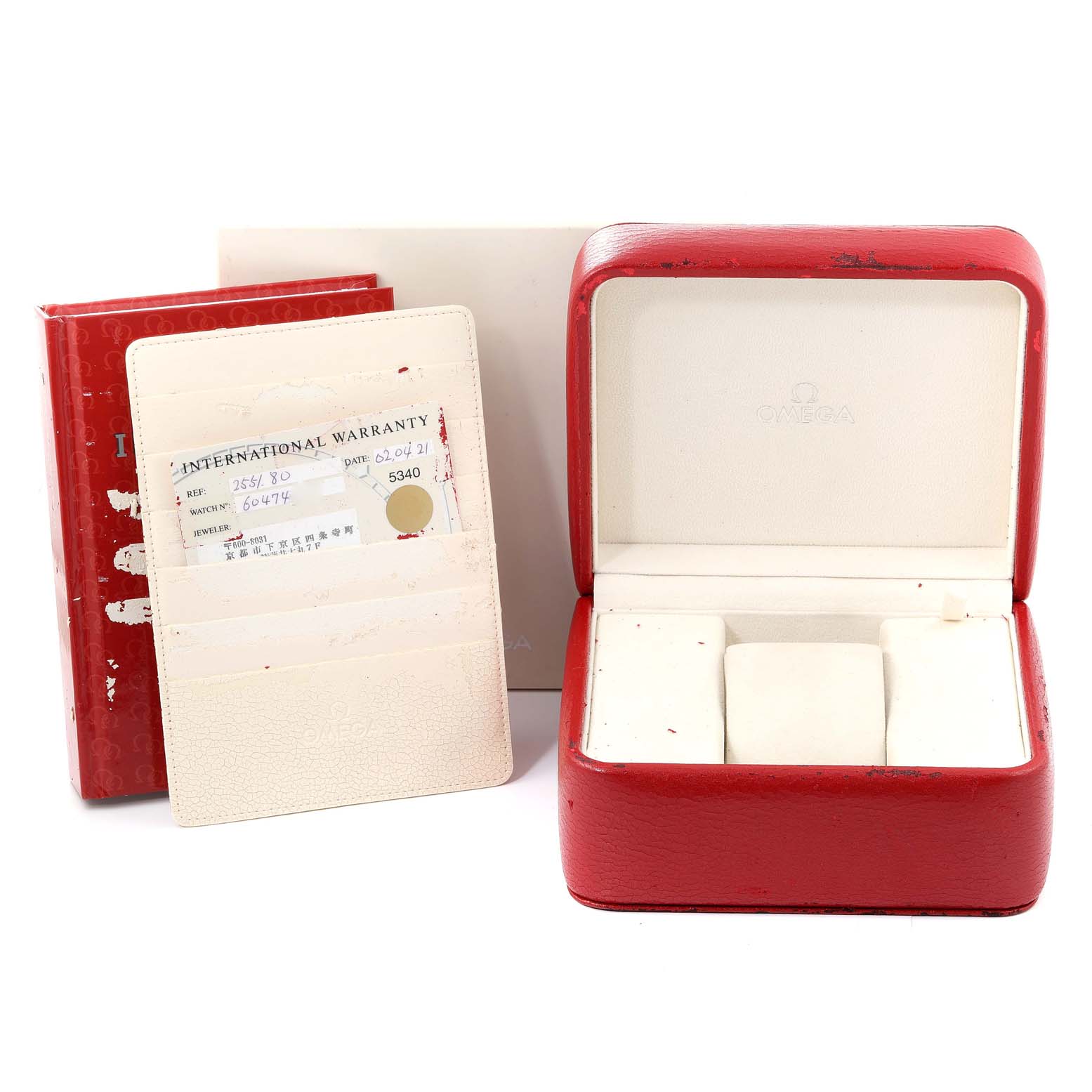 The image shows an Omega Seamaster 2551.80.00 Men's Stainless Steel Blue Dial 2551.80.00 Men's Stainless Steel Blue Dial watch box, international warranty card, and a red Omega-branded booklet.