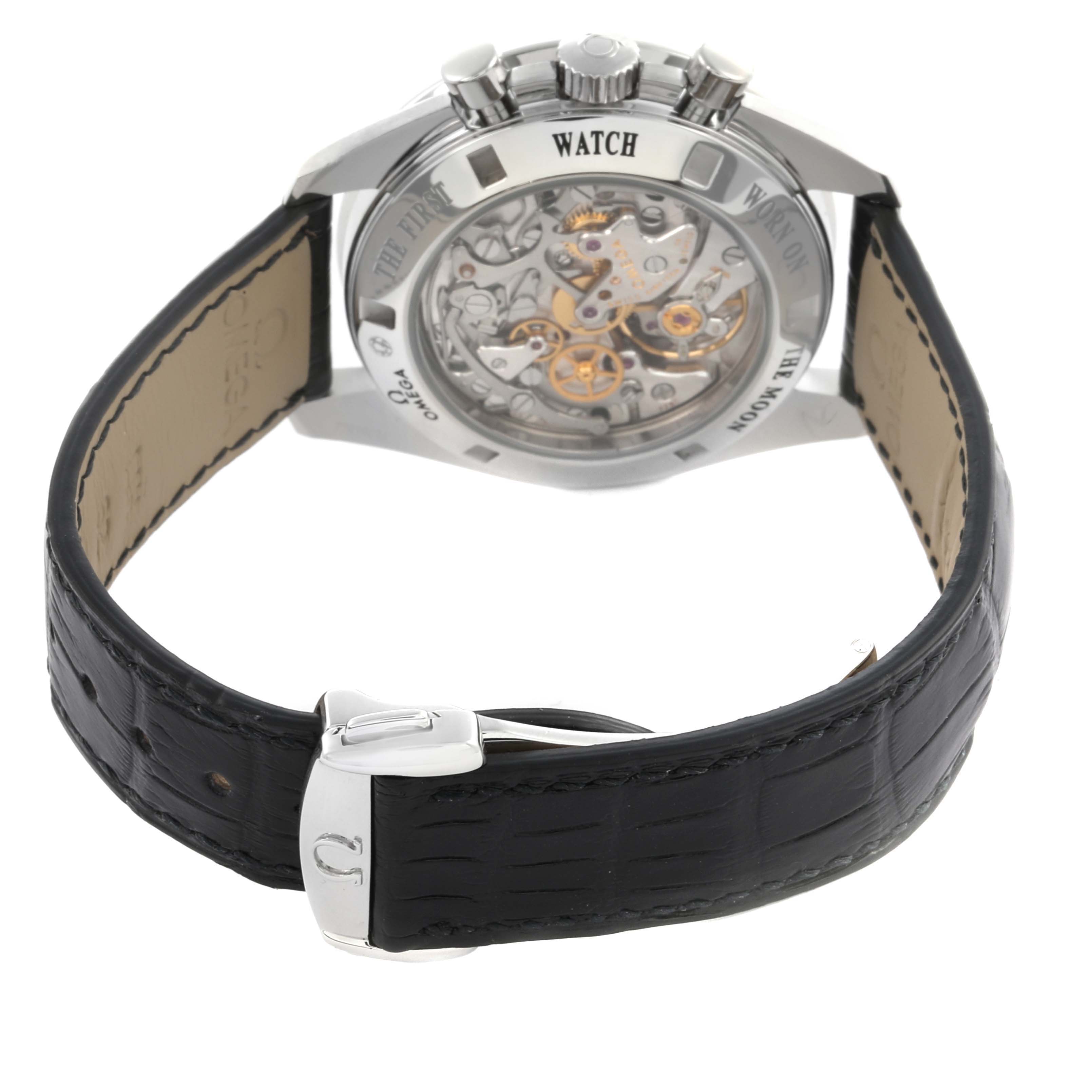 The image shows the back view of the Omega Speedmaster 311.30.42.30.01.006 Men
s Stainless Steel Black Dial 311.30.42.30.01.006 Men
s Stainless Steel Black Dial, highlighting its transparent case back and leather strap.