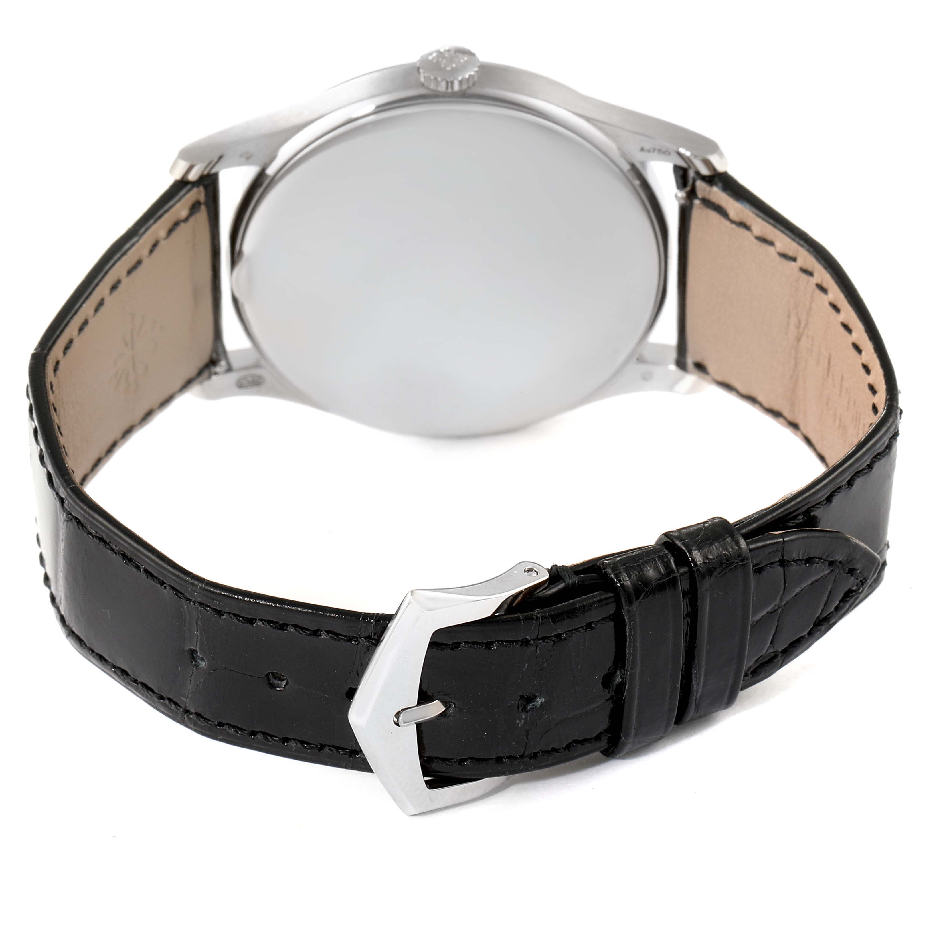 The image shows the rear view of a Patek Philippe Calatrava 5196G Men's White Gold Silver Dial 5196G Men's White Gold Silver Dial watch, highlighting its leather strap and buckle.