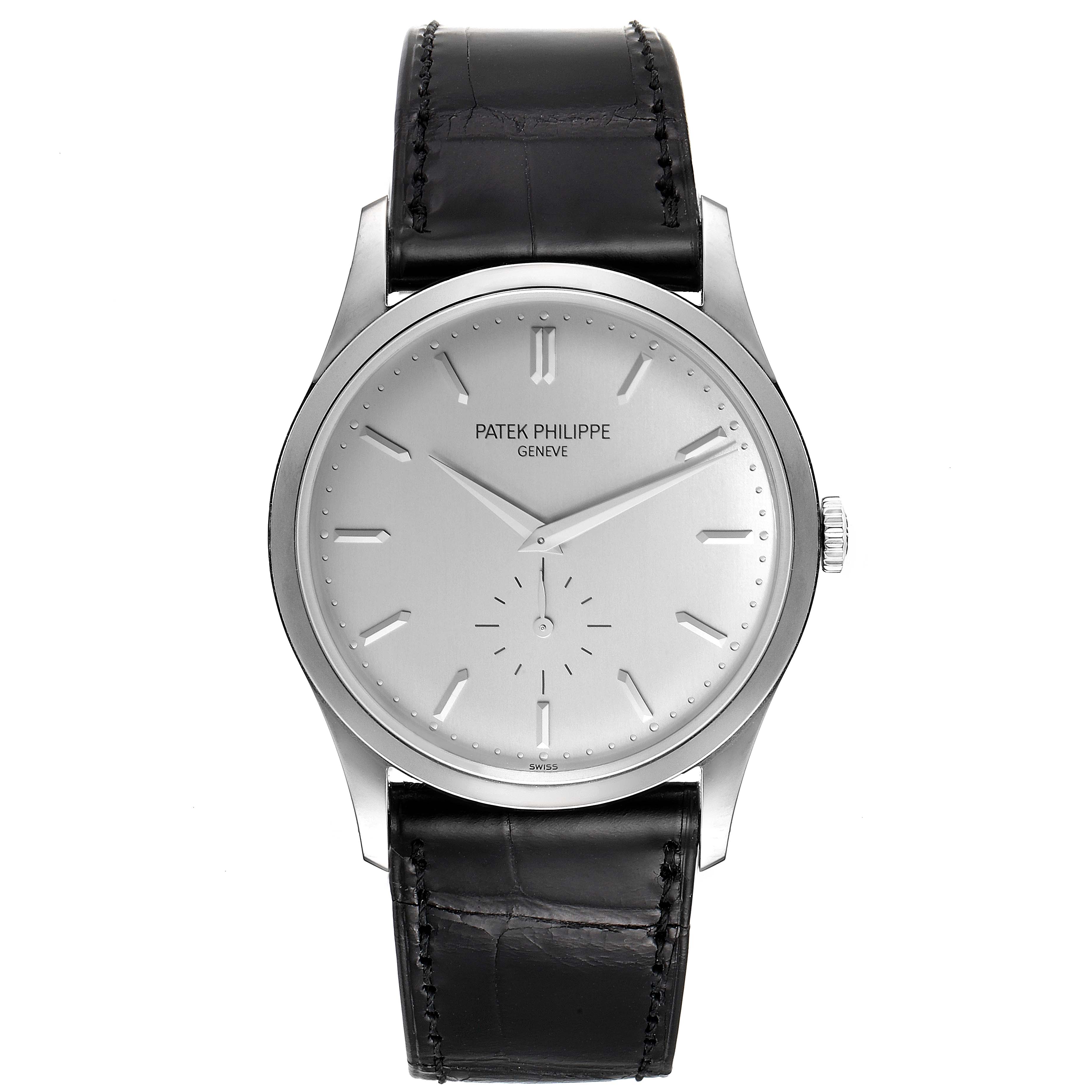 This image features a frontal view of a Patek Philippe Calatrava 5196G Men's White Gold Silver Dial 5196G Men's White Gold Silver Dial watch, showcasing the dial, hands, crown, and leather strap.