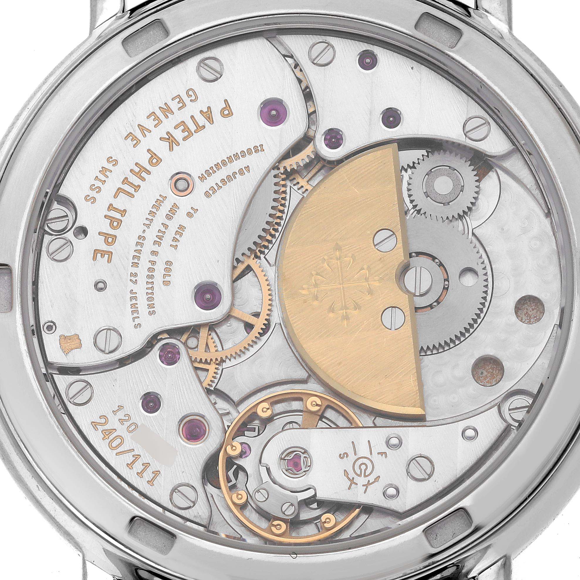 The image shows the movement and internal mechanics of a Patek Philippe Calatrava 5120G-001 Men's White Gold White Dial 5120G-001 Men's White Gold White Dial watch from a back view.
