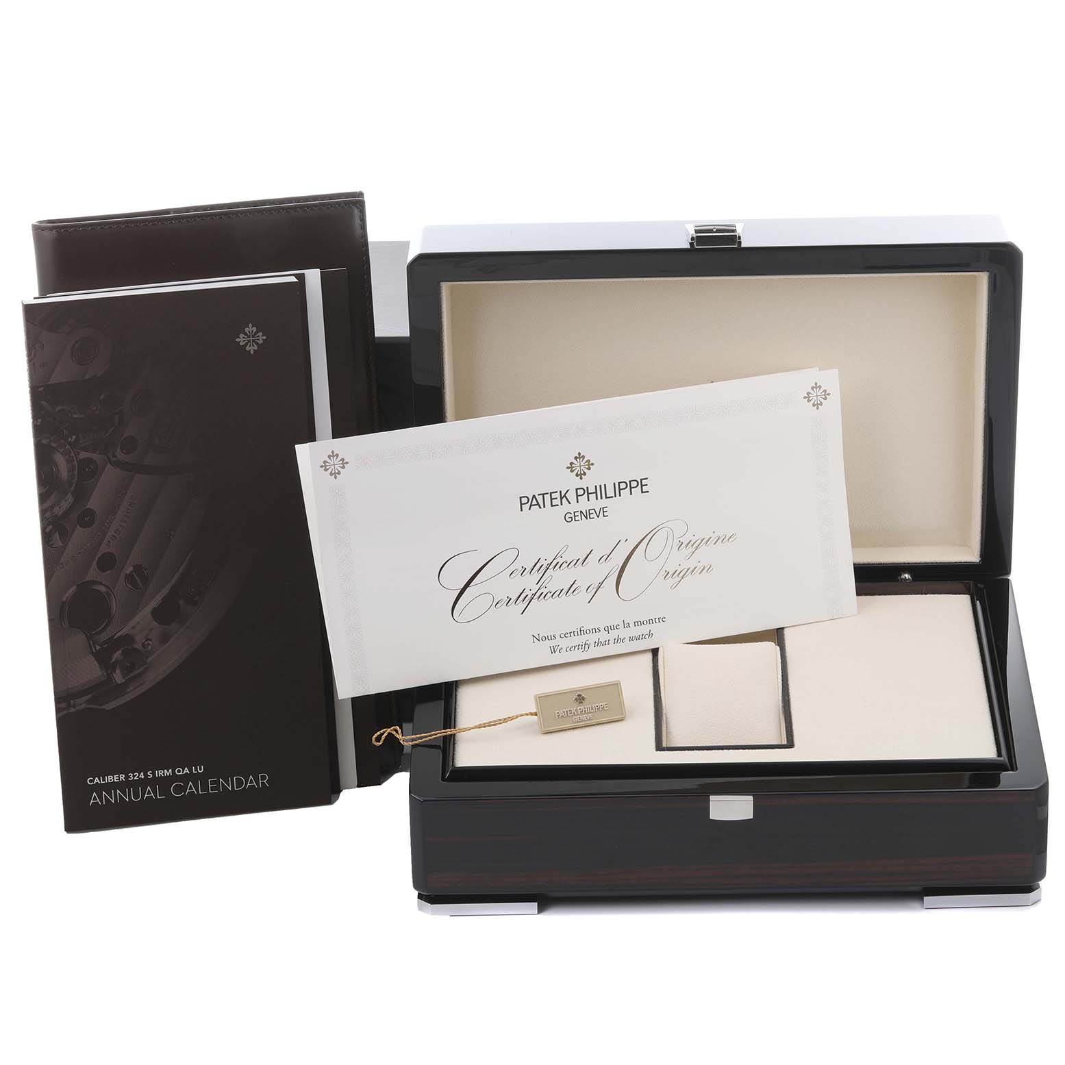 The image shows a box, certificate, and booklet for the Patek Philippe Complications 5146J-001 Men's Yellow Gold White Dial 5146J-001 Men's Yellow Gold White Dial model from a frontal angle.