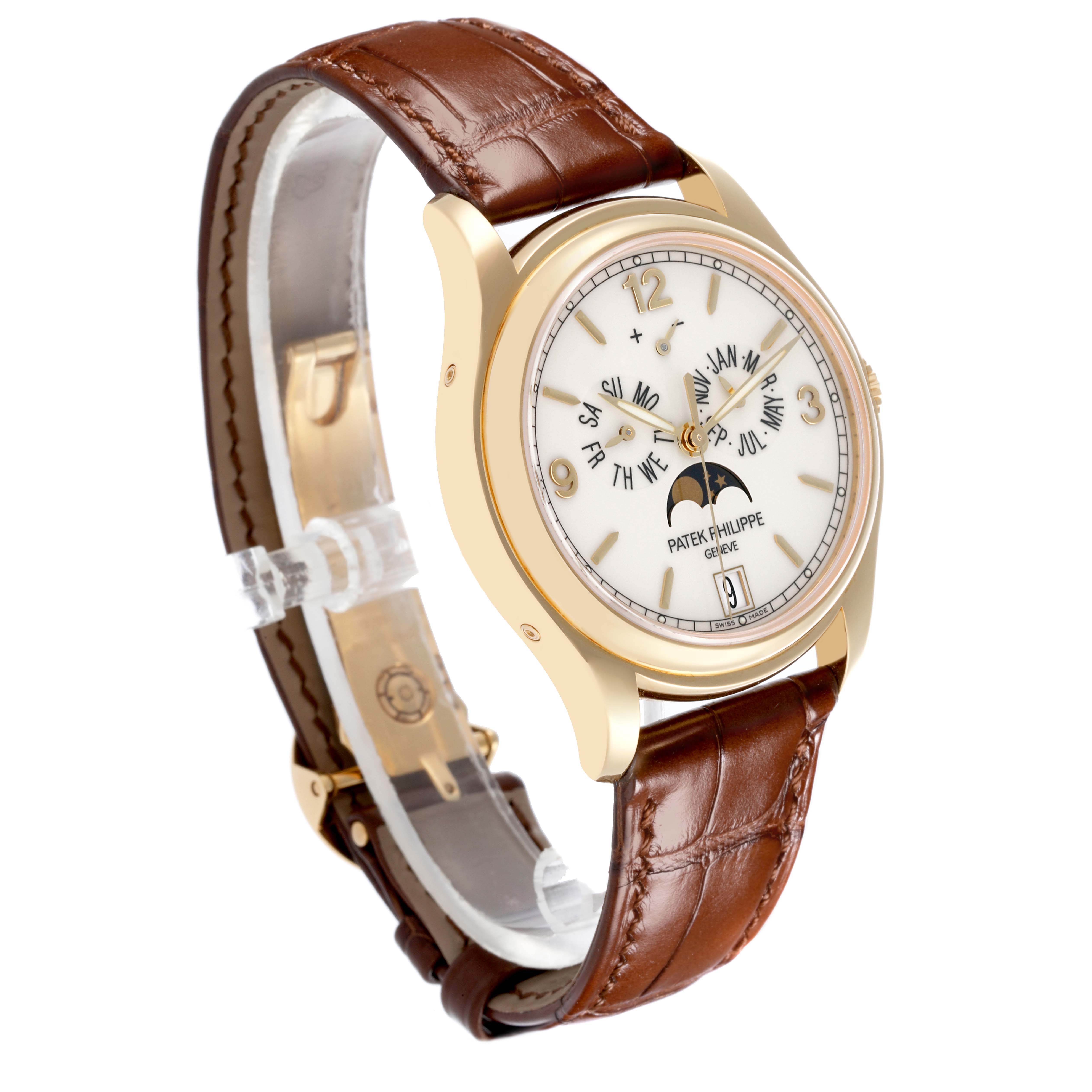 The Patek Philippe Complications 5146J-001 Men's Yellow Gold White Dial 5146J-001 Men's Yellow Gold White Dial watch is shown at a three-quarter angle, displaying the dial, case, and leather strap.