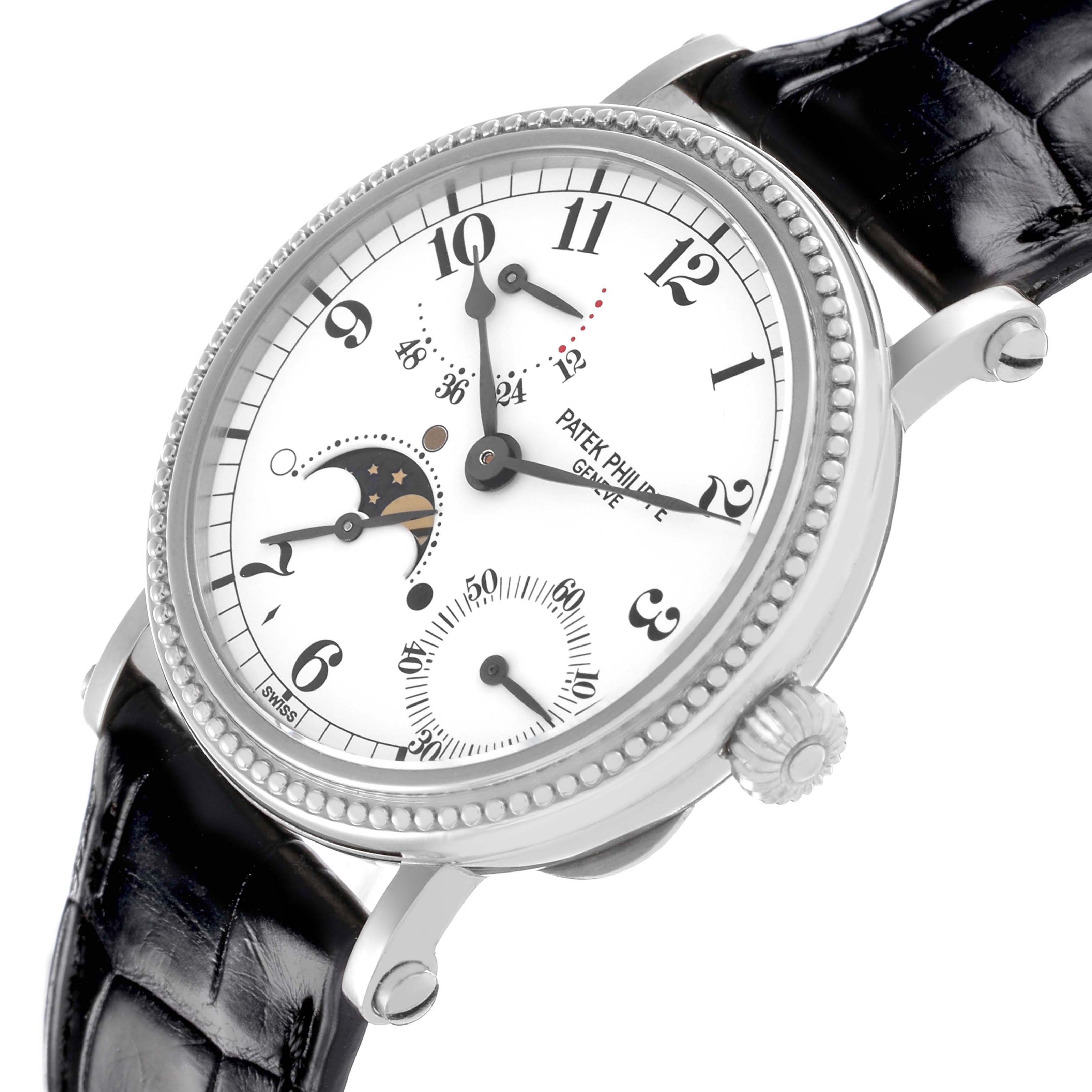 The Patek Philippe Complications 5015G Men's White Gold White Dial watch is shown at a three-quarter angle, highlighting the face, crown, and part of the strap.