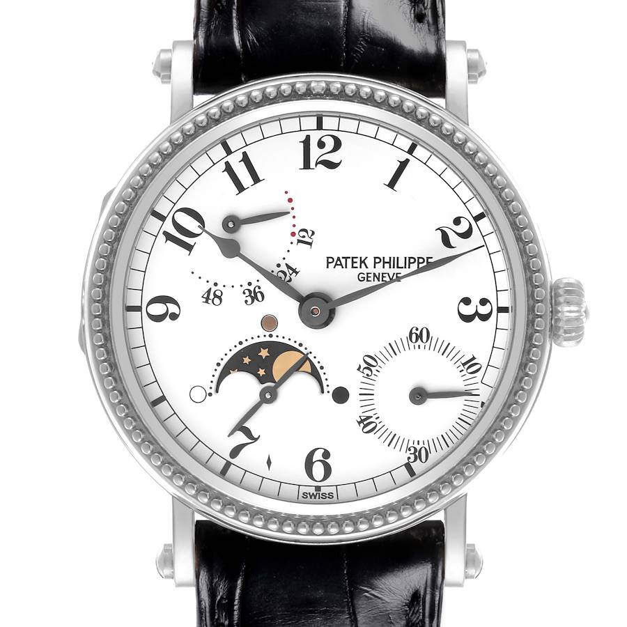 The Patek Philippe Complications watch is shown from a front angle, highlighting the face and dial details.