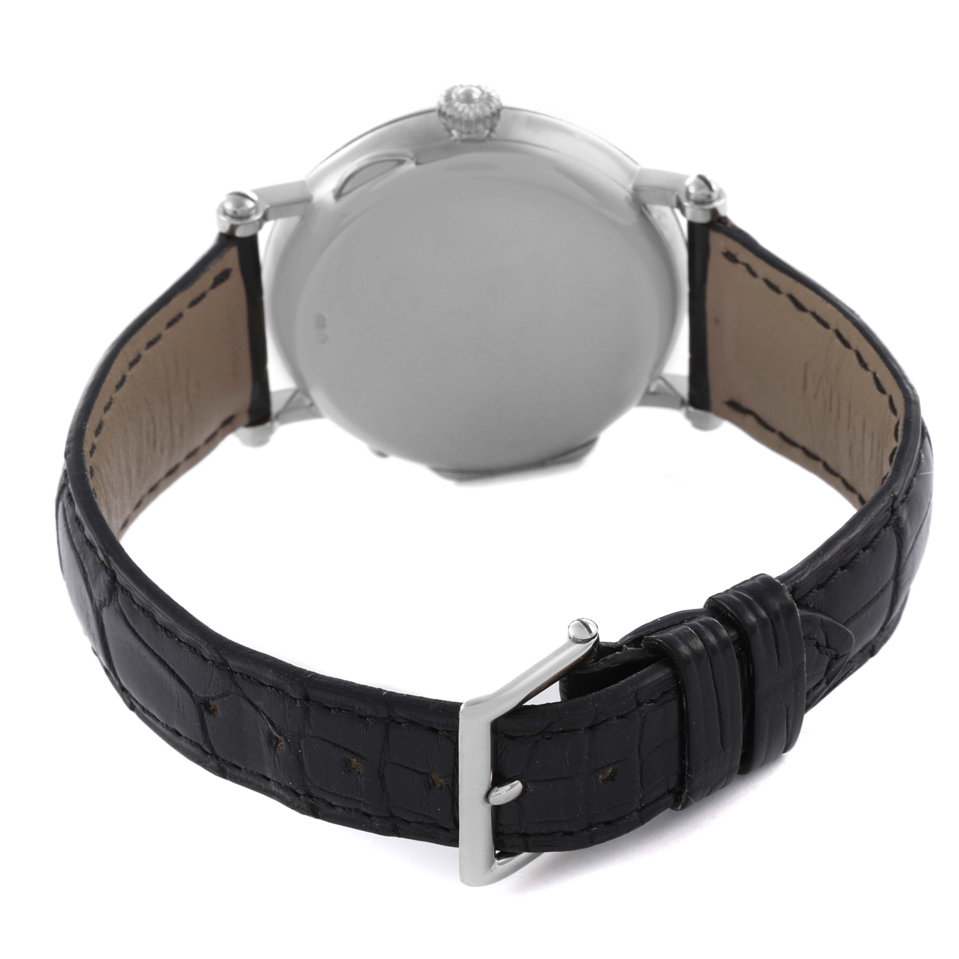 The Patek Philippe Complications 5015G Men's White Gold White Dial 5015G Men's White Gold White Dial watch is shown from the back, featuring the case and black leather strap.