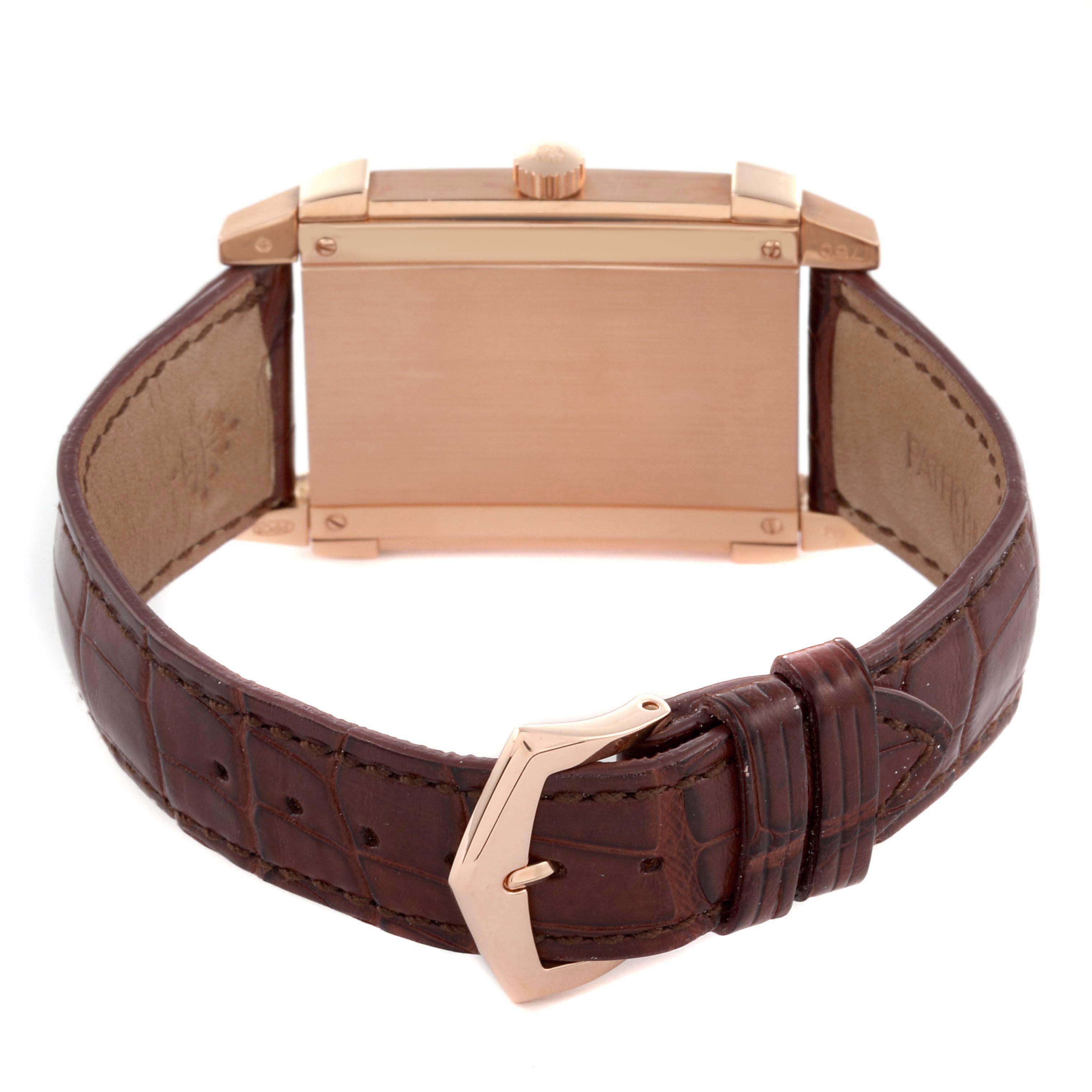 The Patek Philippe Gondolo 5111R-001 Men's Rose Gold Silver Dial 5111R-001 Men's Rose Gold Silver Dial watch is shown from the back, highlighting its case, crown, leather strap, and clasp.