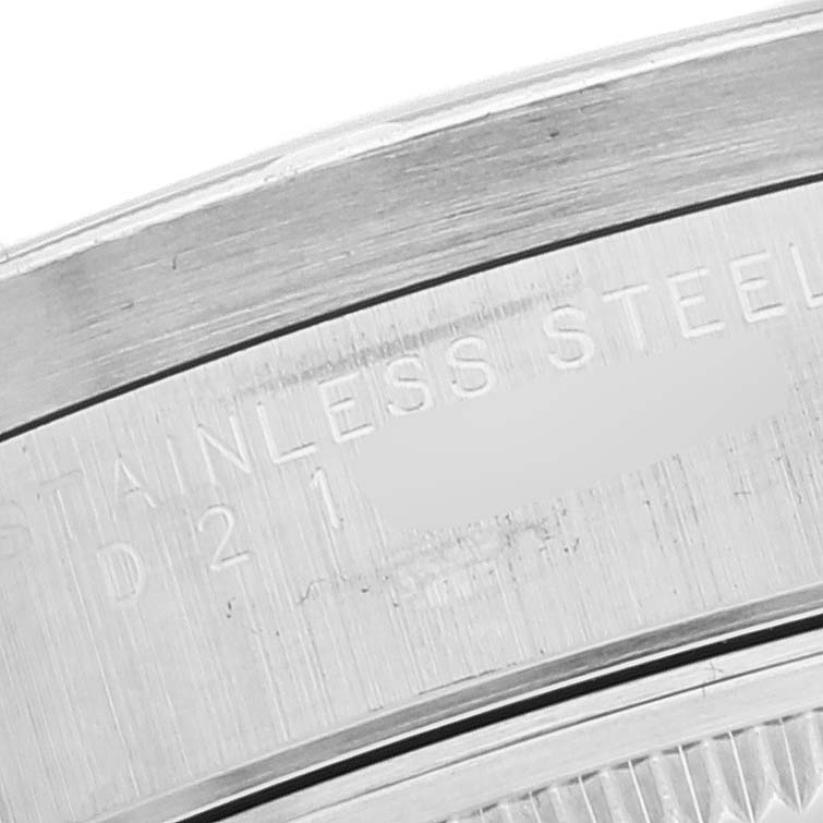This close-up image shows the stainless steel case back of a Rolex Air-King 14010 Men's Stainless Steel White Dial 14010 Men's Stainless Steel White Dial watch.