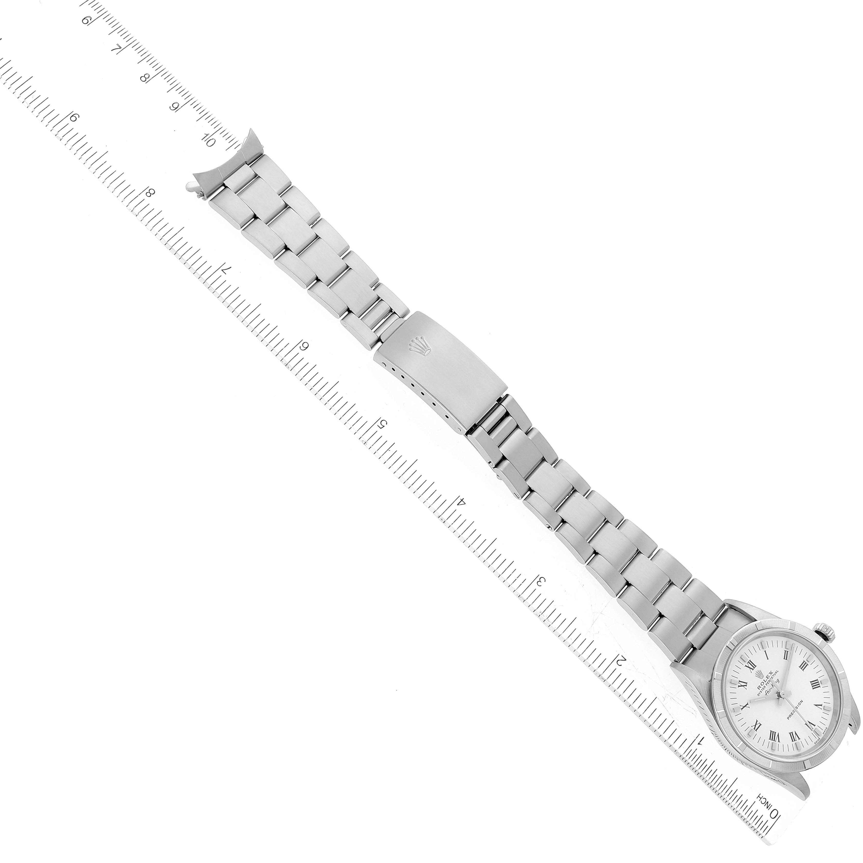 The image shows a Rolex Air-King 14010 Men's Stainless Steel White Dial 14010 Men's Stainless Steel White Dial watch, including the face, bracelet, and clasp, laid out next to a ruler for measurement.