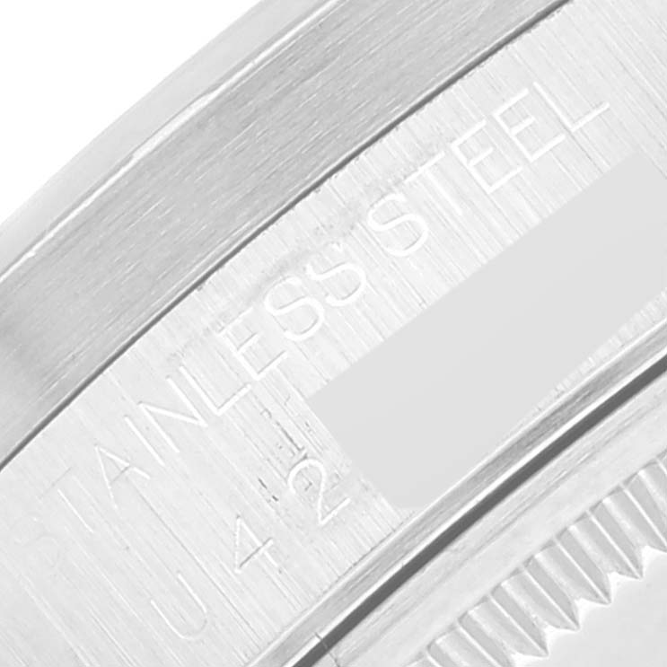 This image shows a close-up view of the stainless steel casing and engravings on a Rolex Air-King 14010 Men's Stainless Steel Black Dial 14010 Men's Stainless Steel Black Dial watch.