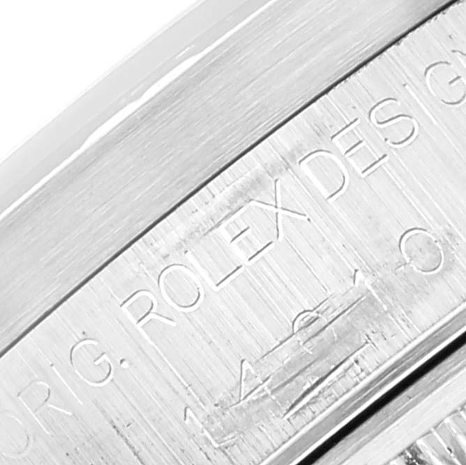 The image shows a close-up of the engraved case back edge of a Rolex Air-King 14010 Men's Stainless Steel Black Dial 14010 Men's Stainless Steel Black Dial watch.
