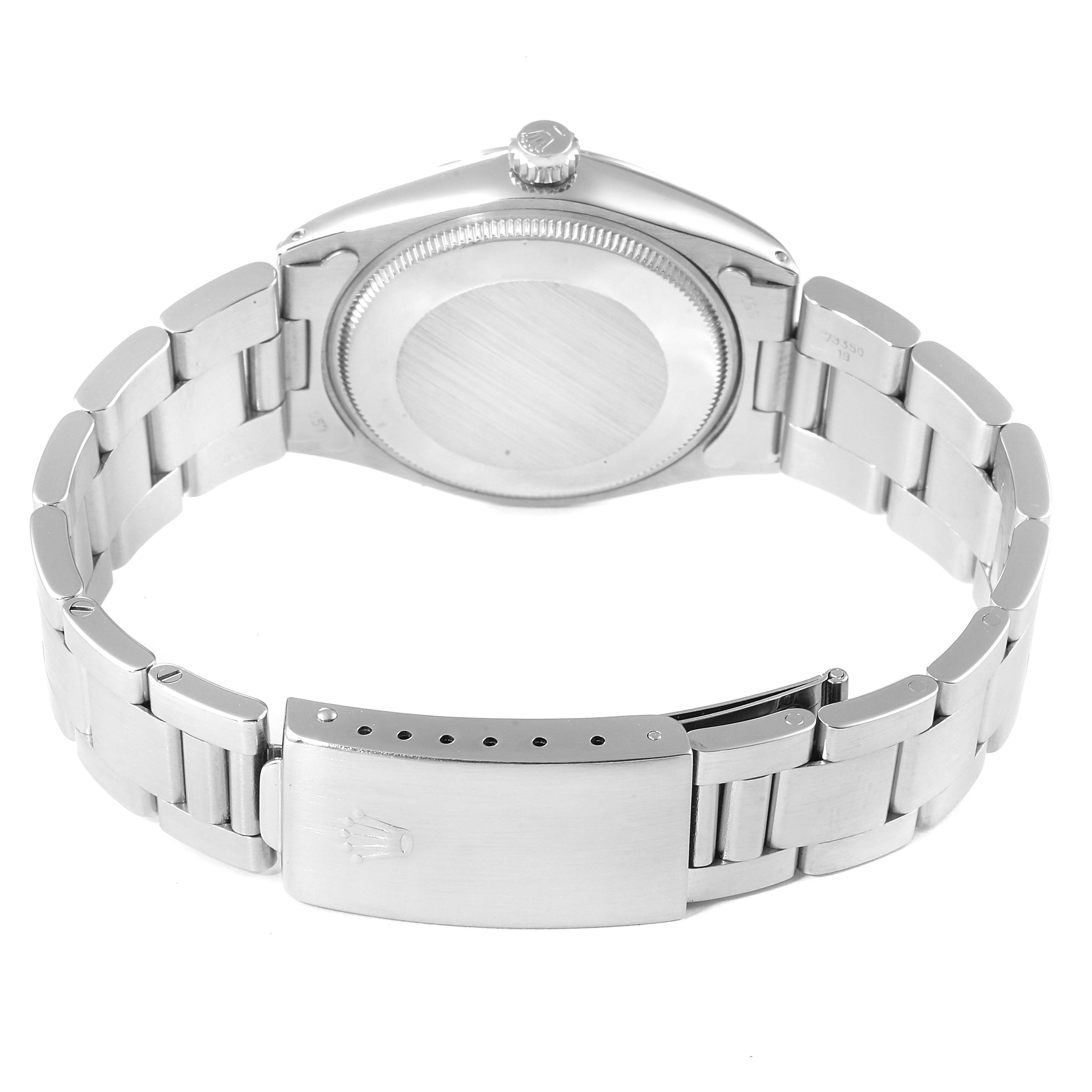 This image shows the back case and bracelet of the Rolex Air-King 5500 Men's Stainless Steel Silver Dial 5500 Men's Stainless Steel Silver Dial watch, with the clasp open.