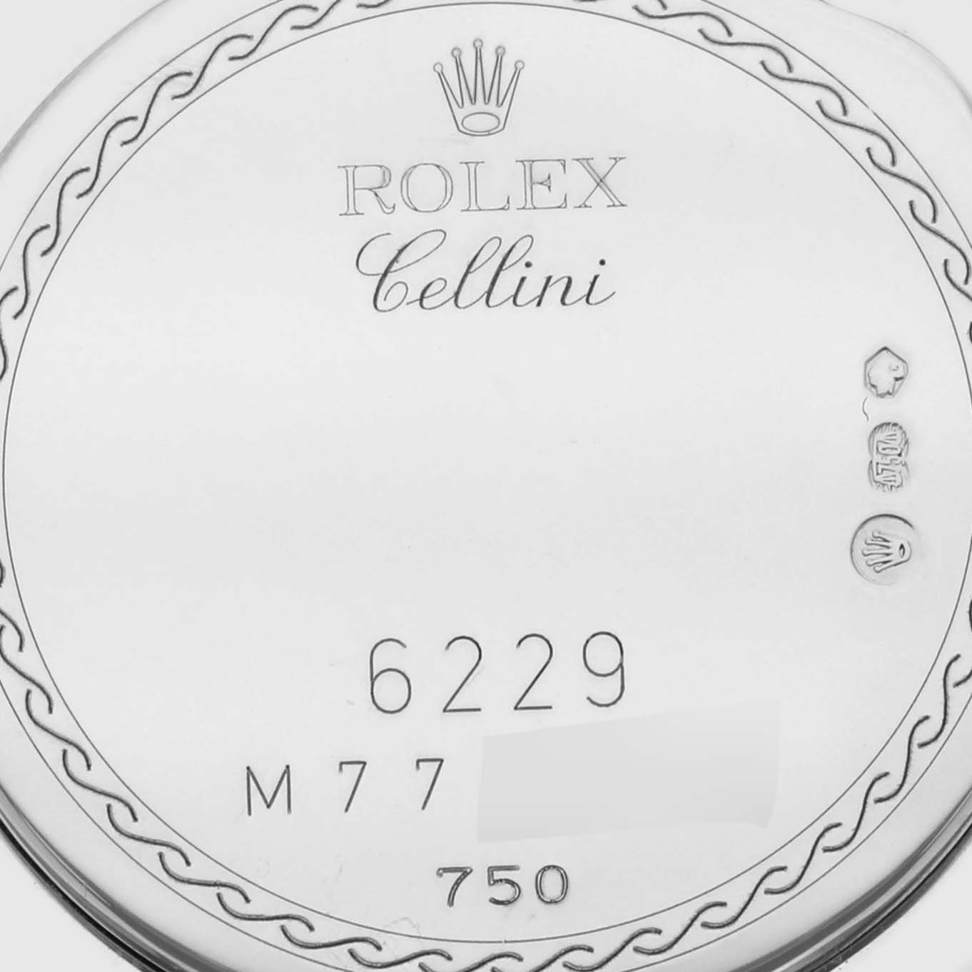 The image shows the engraved case back of a Rolex Cellini 6229/9BIC Women's Steel and Gold (two tone) White Dial 6229/9BIC Women's Steel and Gold (two tone) White Dial watch, featuring its brand logo and model number.