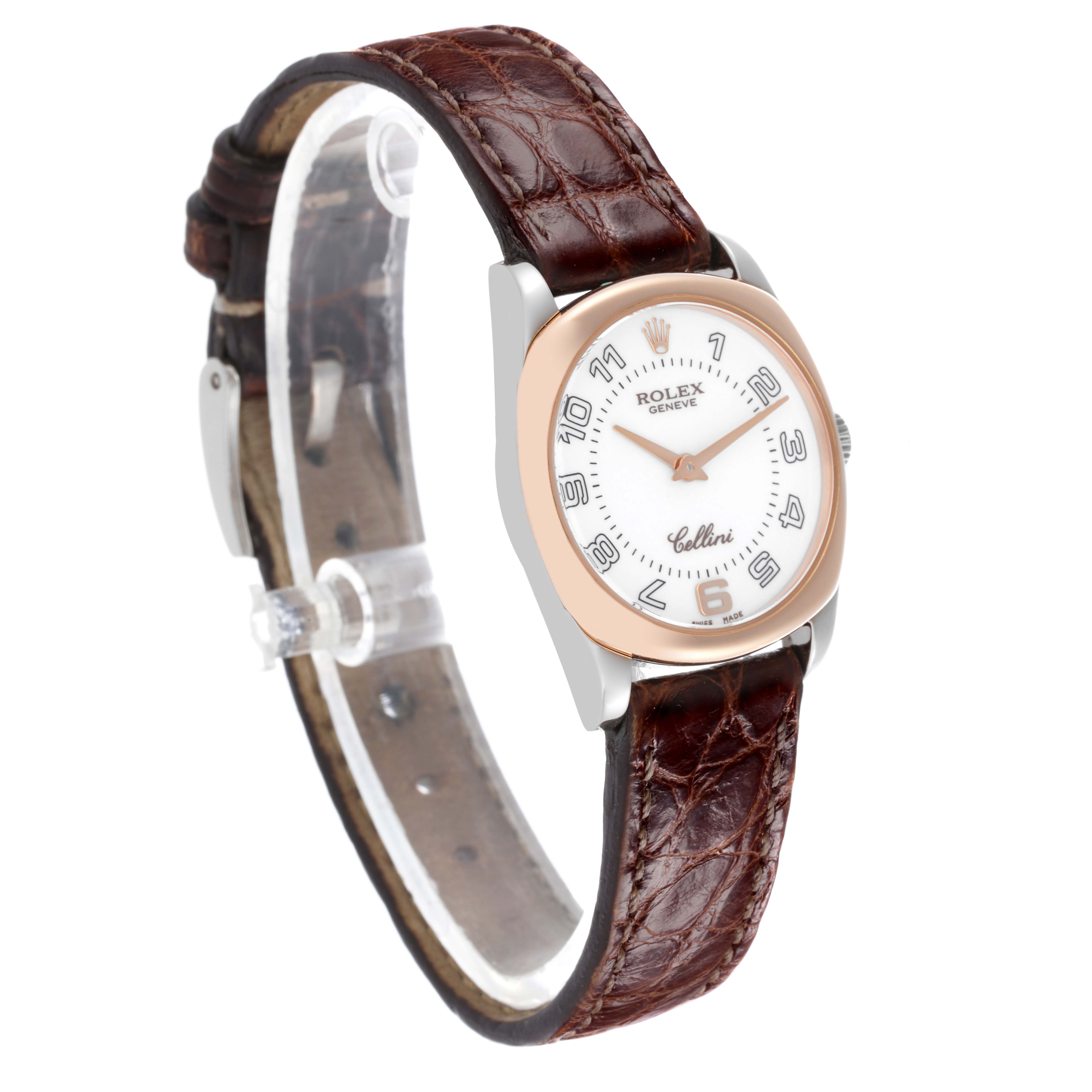 The image shows a Rolex Cellini 6229/9BIC Women's Steel and Gold (two tone) White Dial 6229/9BIC Women's Steel and Gold (two tone) White Dial watch at a three-quarter angle, highlighting the face, bezel, and leather strap.