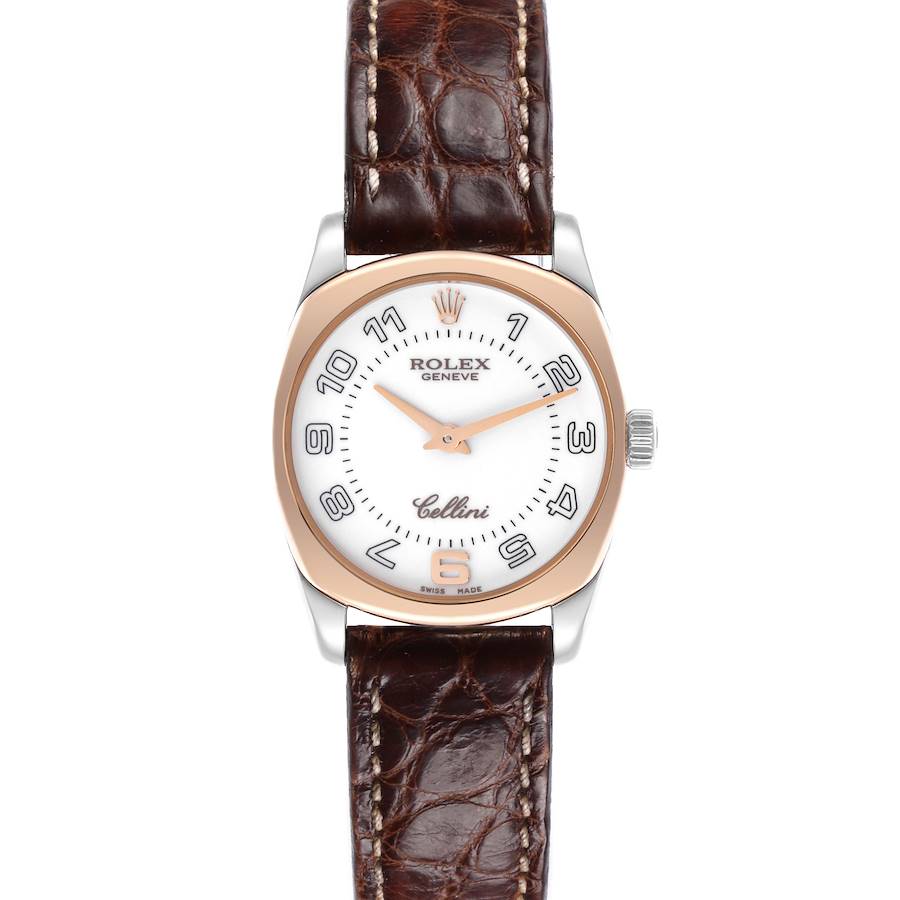 The Rolex Cellini watch is shown from a front angle, displaying the face, bezel, and leather strap.