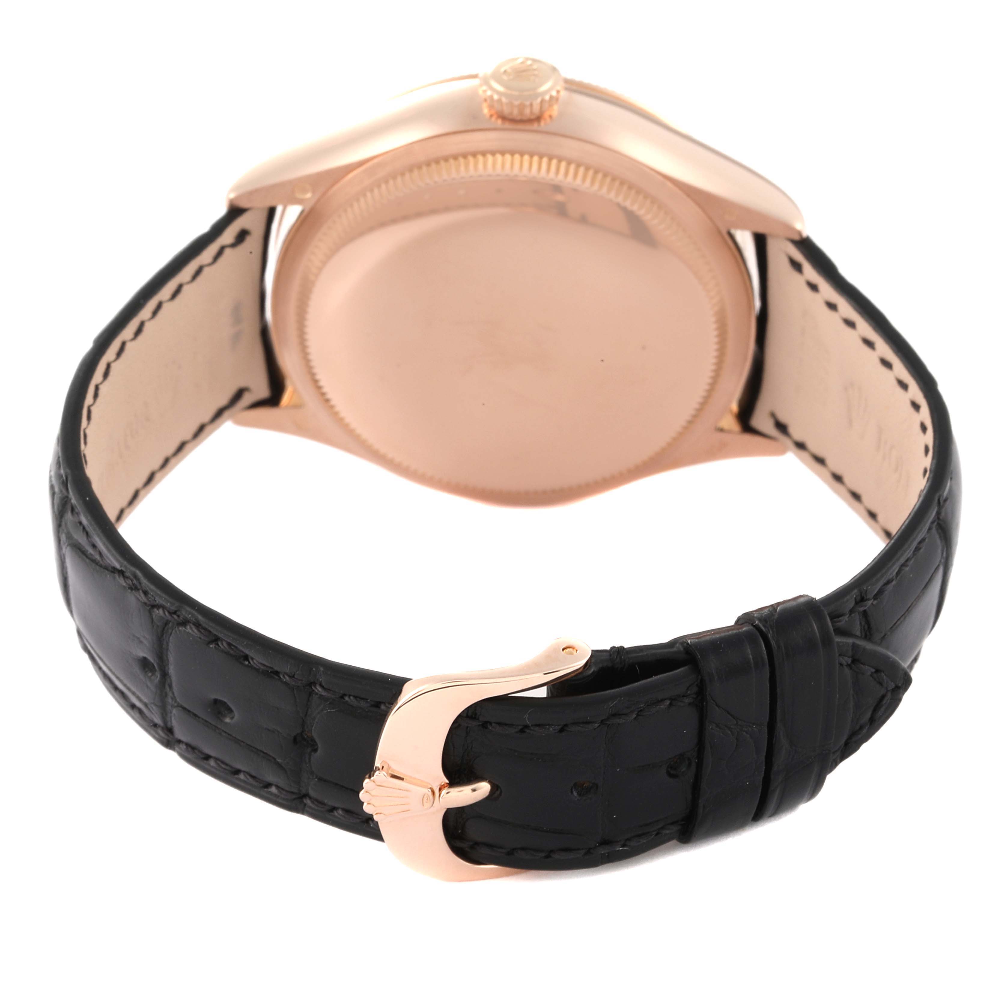 This image shows the back case and leather strap of a Rolex Cellini 50515 Men
s Rose Gold Silver Dial 50515 Men
s Rose Gold Silver Dial watch.