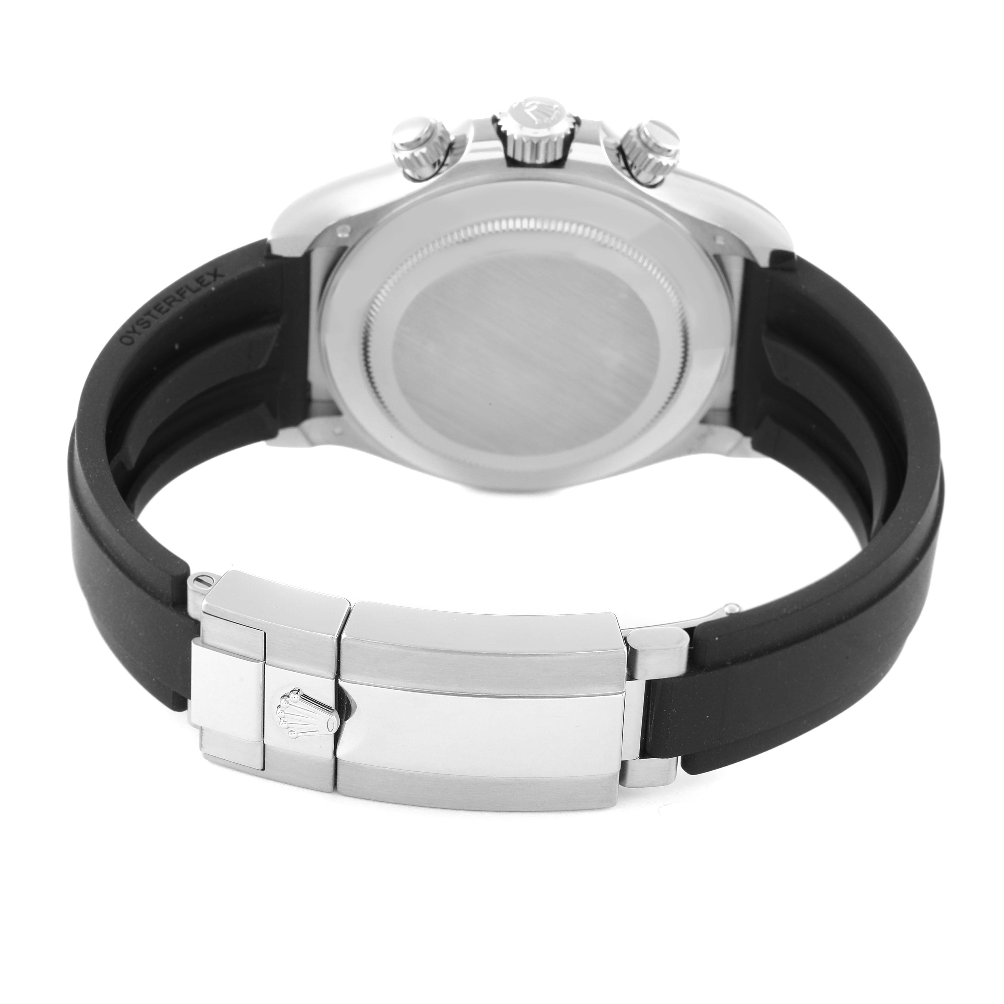 This image shows the back view of a Rolex Daytona 116519 Men's White Gold Grey Dial 116519 Men's White Gold Grey Dial watch, highlighting the case back, crown, and clasp on the rubber strap.