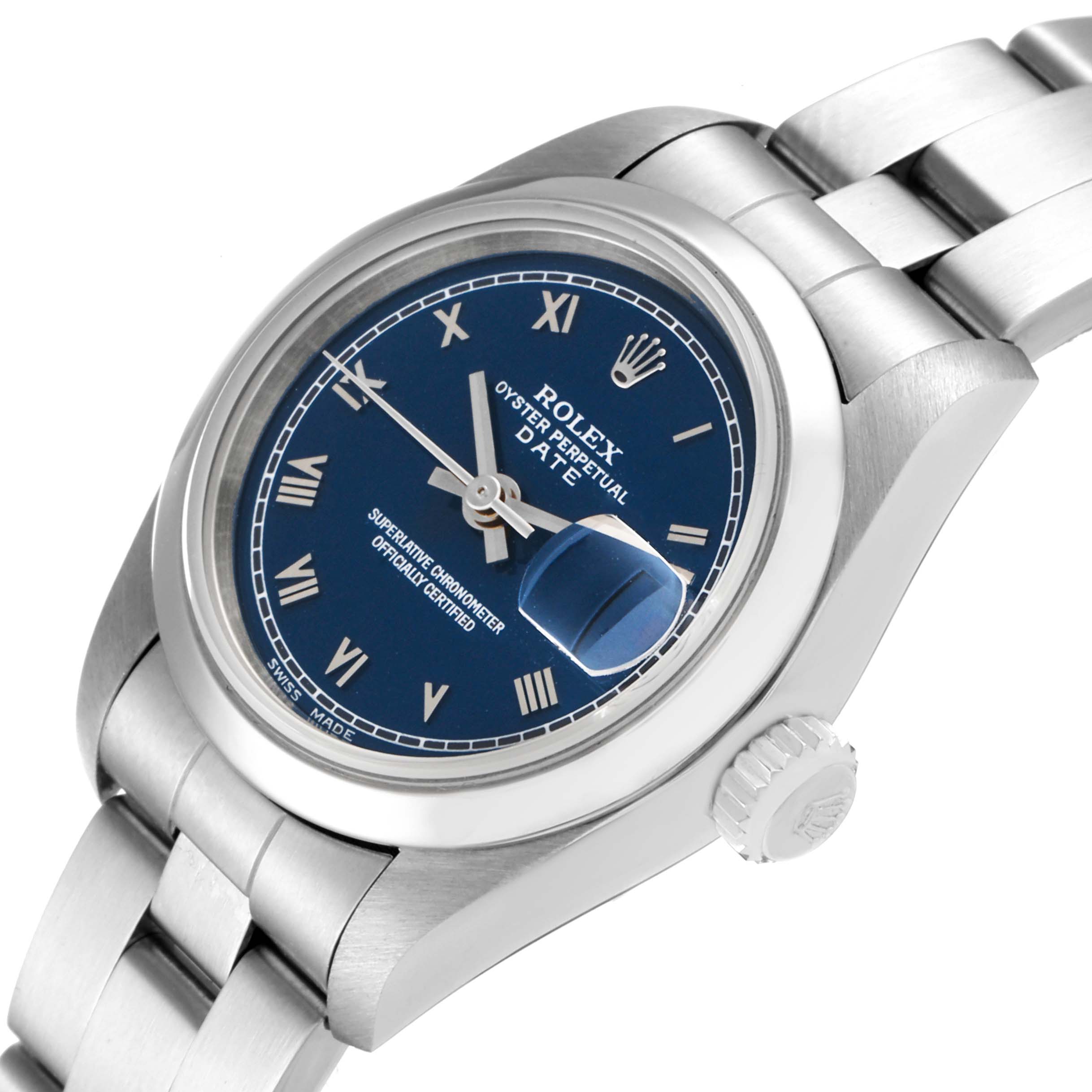 The image shows a Rolex Date 69160 Women's Stainless Steel Blue Dial 69160 Women's Stainless Steel Blue Dial watch at an angle focusing on the dial, crown, and part of the bracelet.
